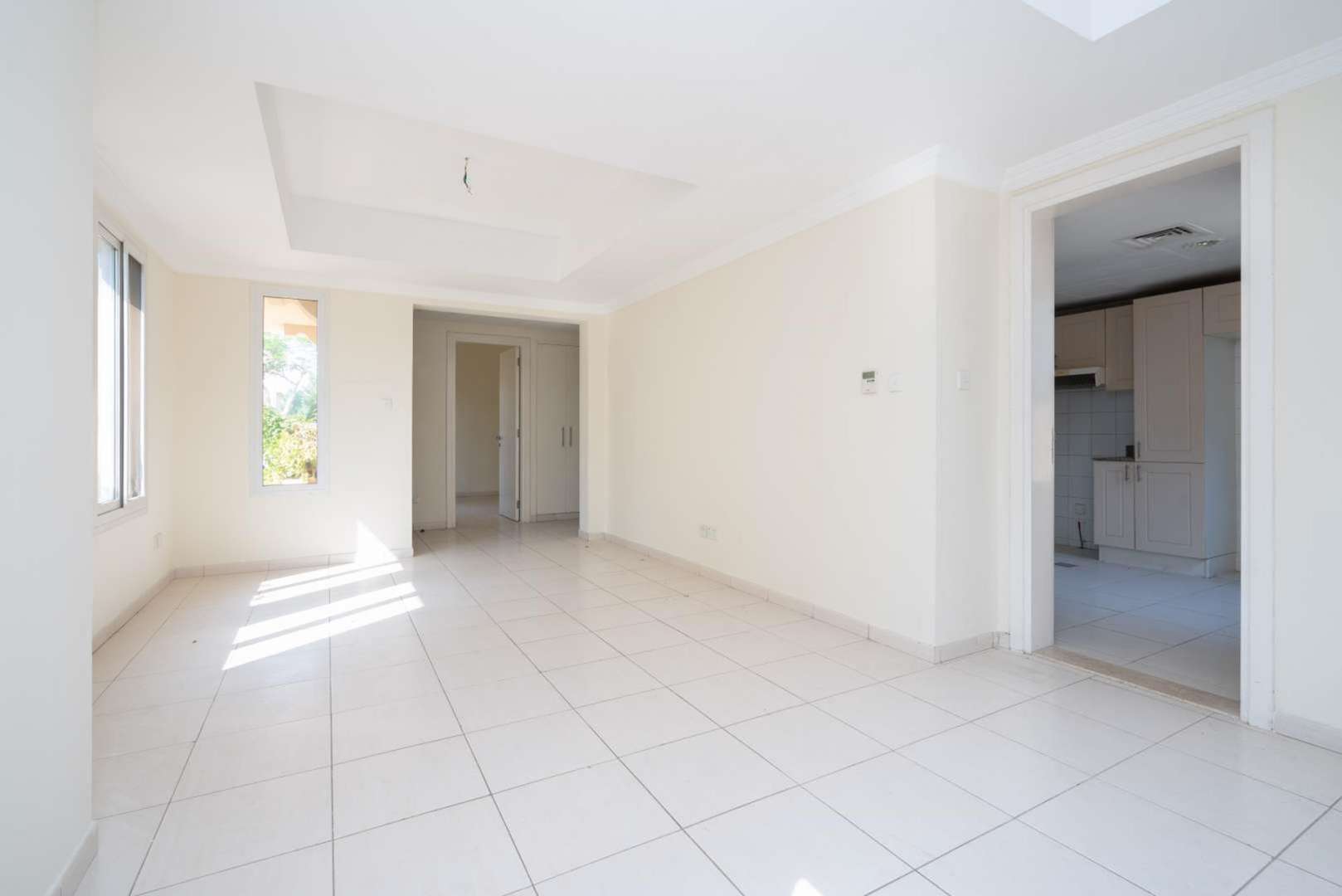 Bright living room in 3-bedroom villa, Springs 9, Emirates Living, with garden view