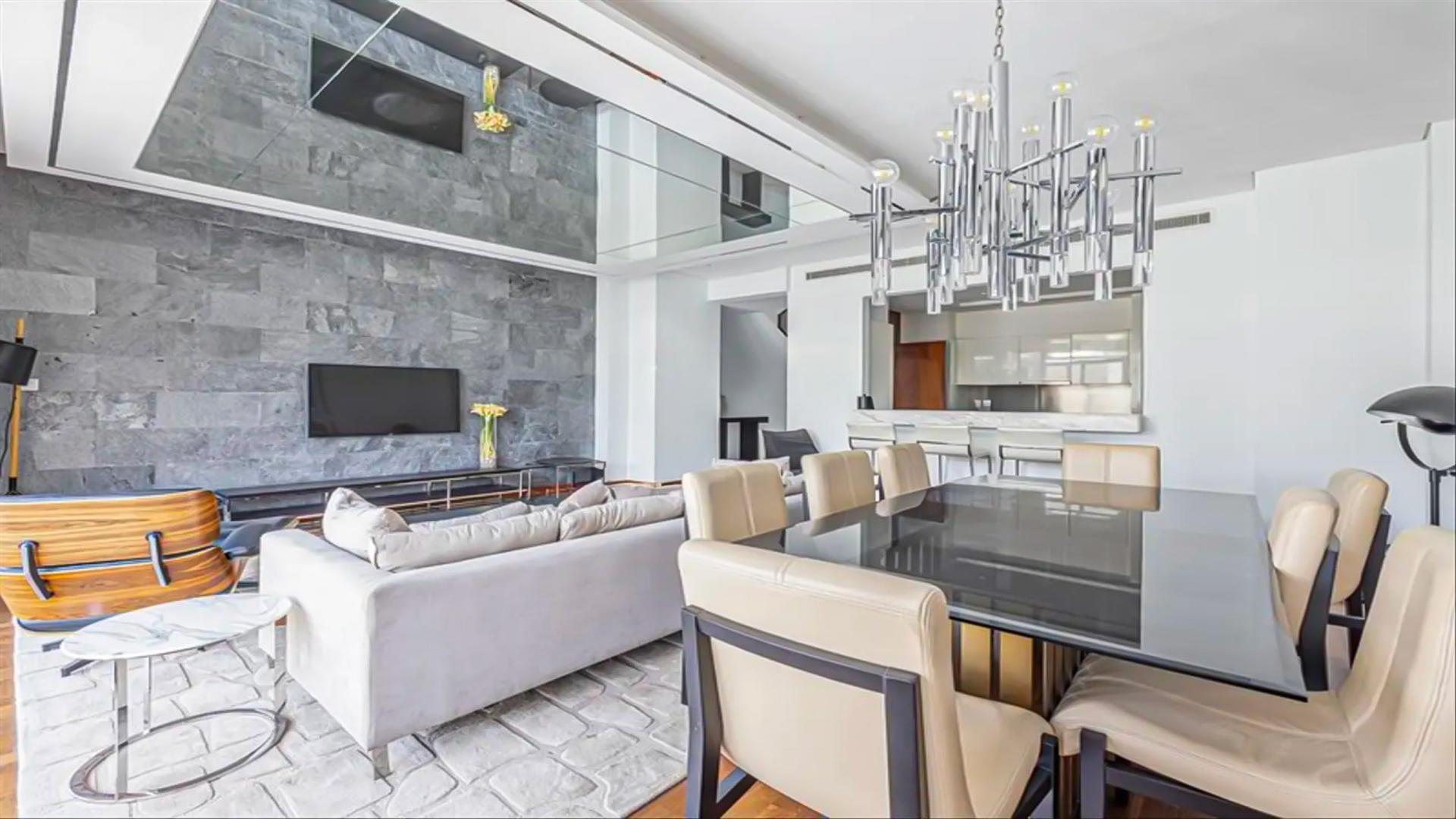 Modern living room with elegant furnishings in Damac Hills villa for rent, Picadilly Green