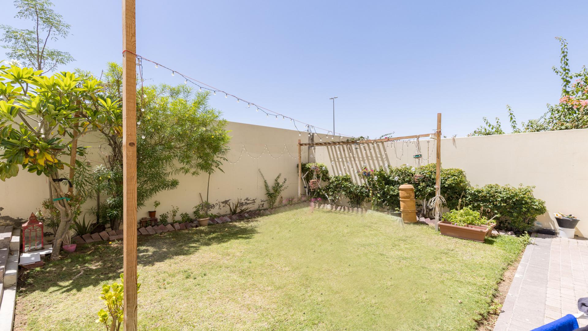 Modern living room in Springs 3 villa, featuring cozy seating and elegant decor