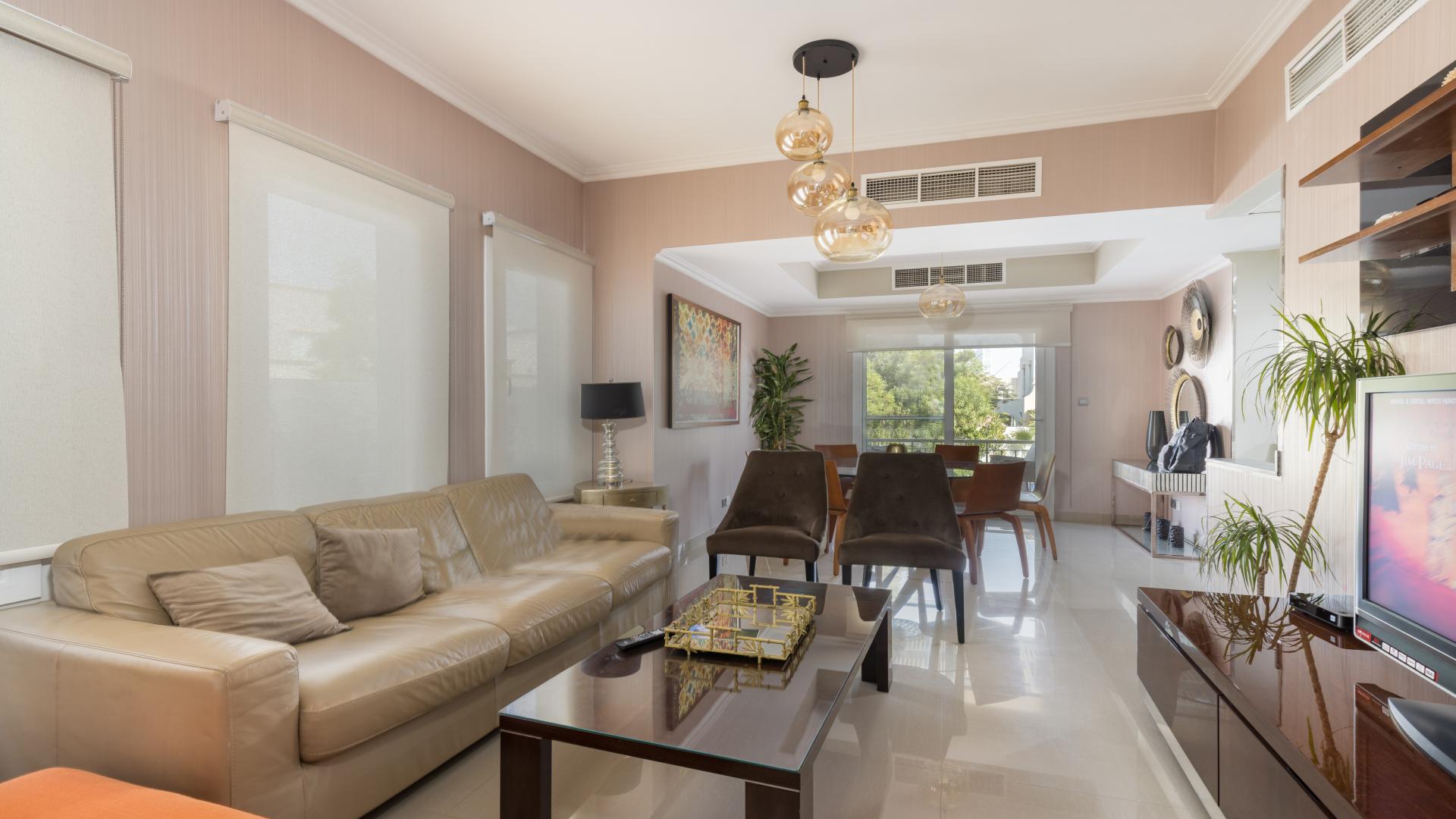 Modern kitchen in fully upgraded villa for rent, Springs 14, featuring sleek appliances