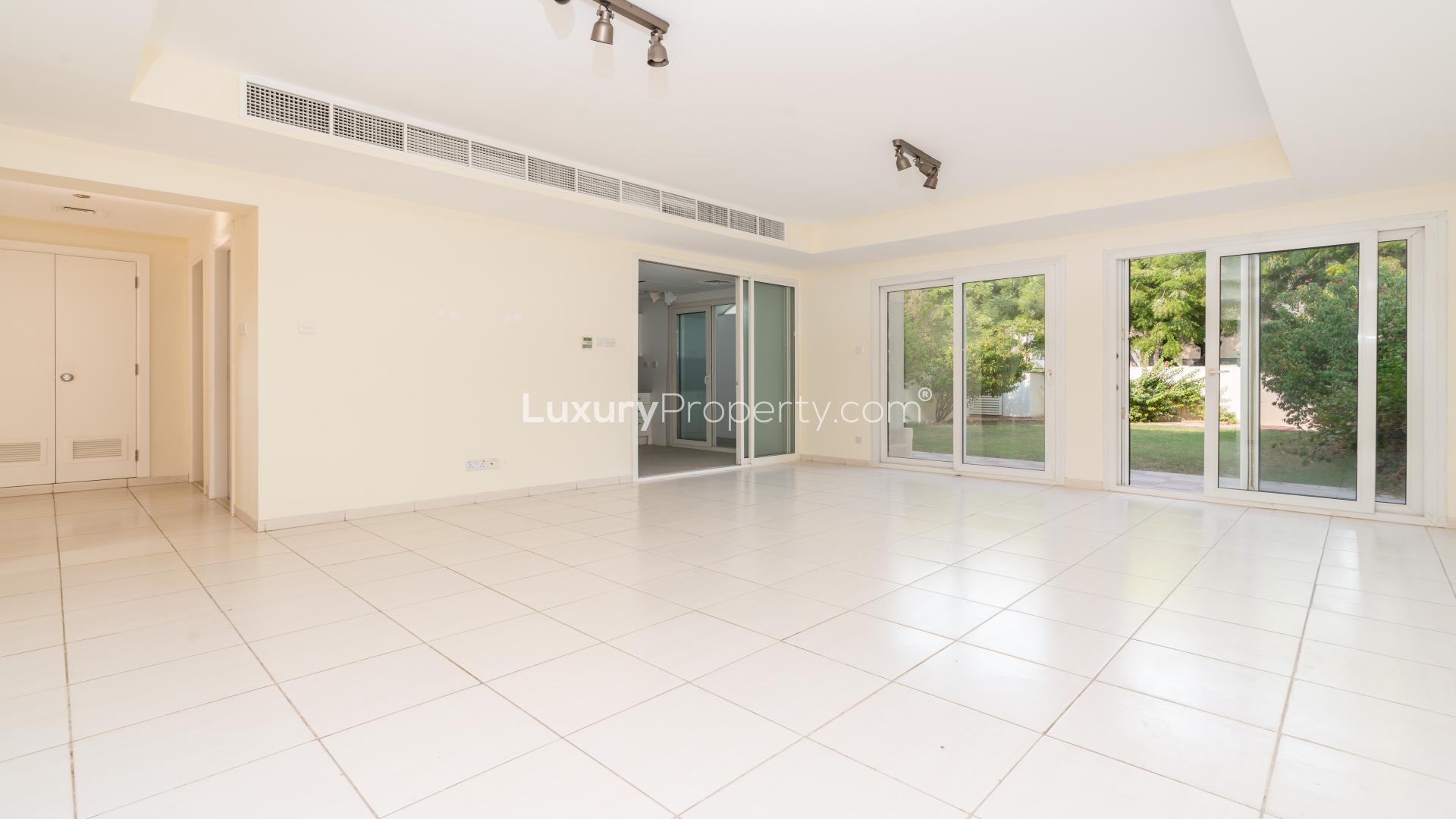 Bright living room in Springs 7 villa with garden view, available for rent