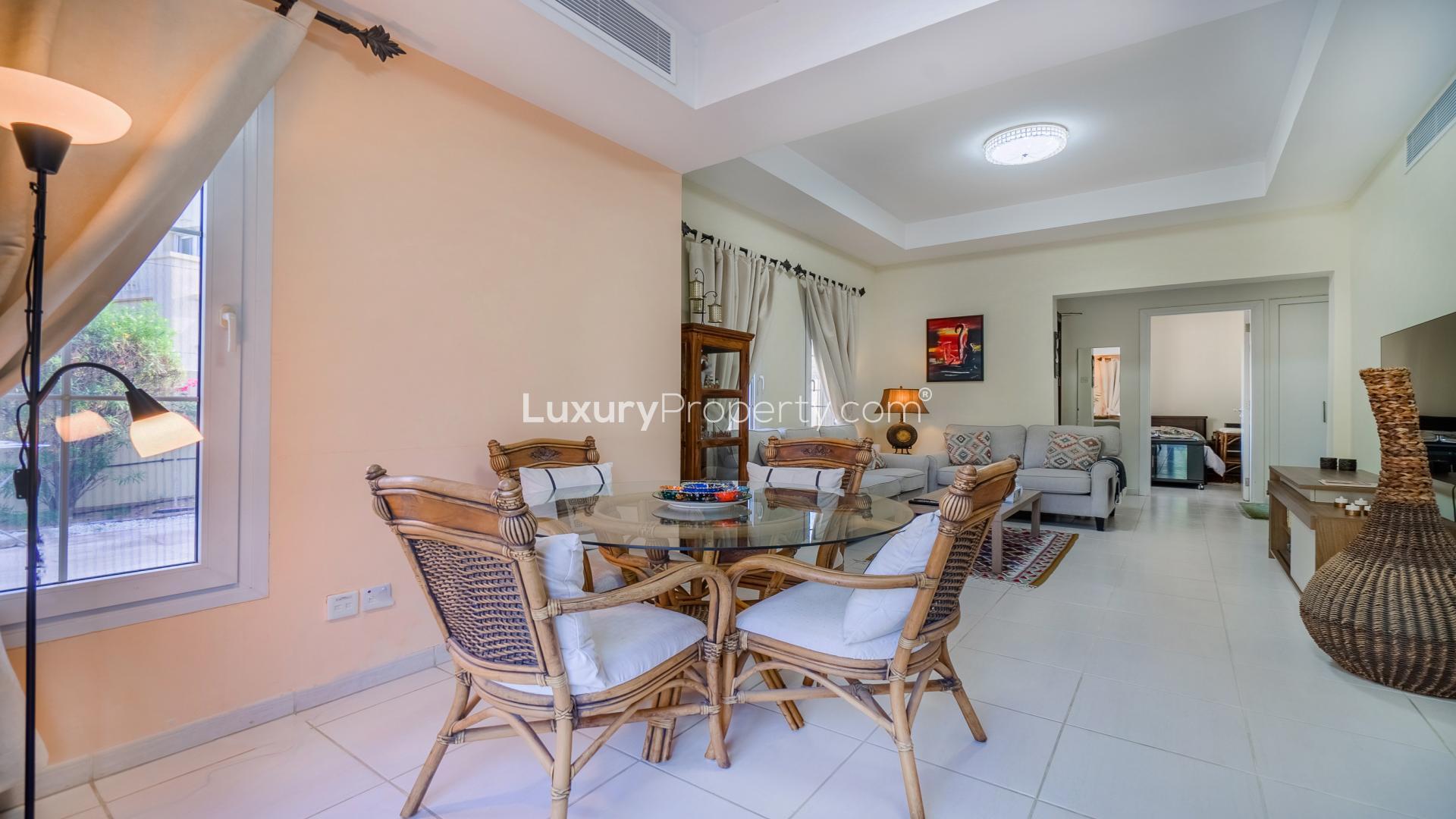 Furnished villa living room in The Springs with modern decor and natural light