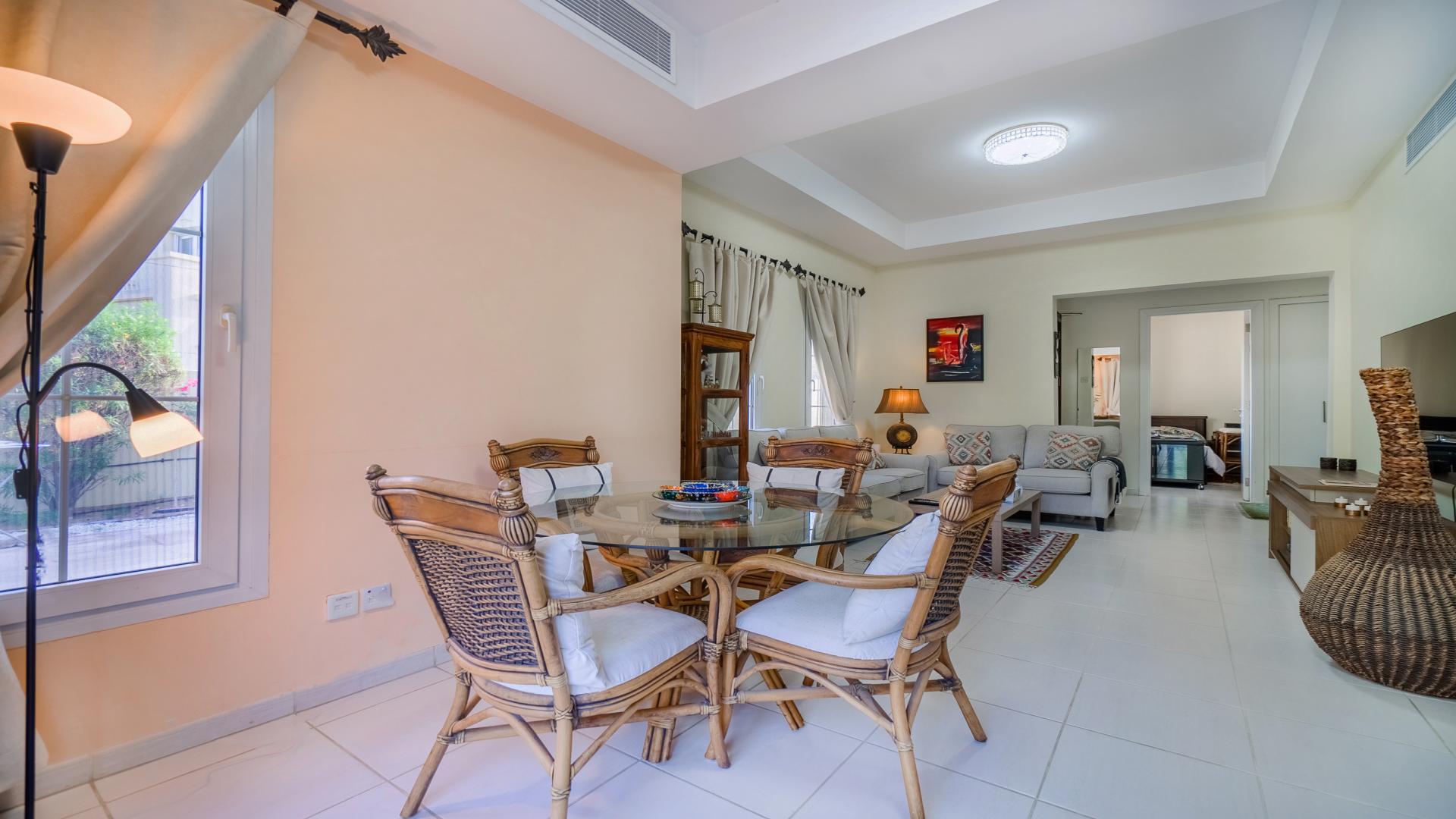 Furnished villa living room in The Springs with modern decor and natural light