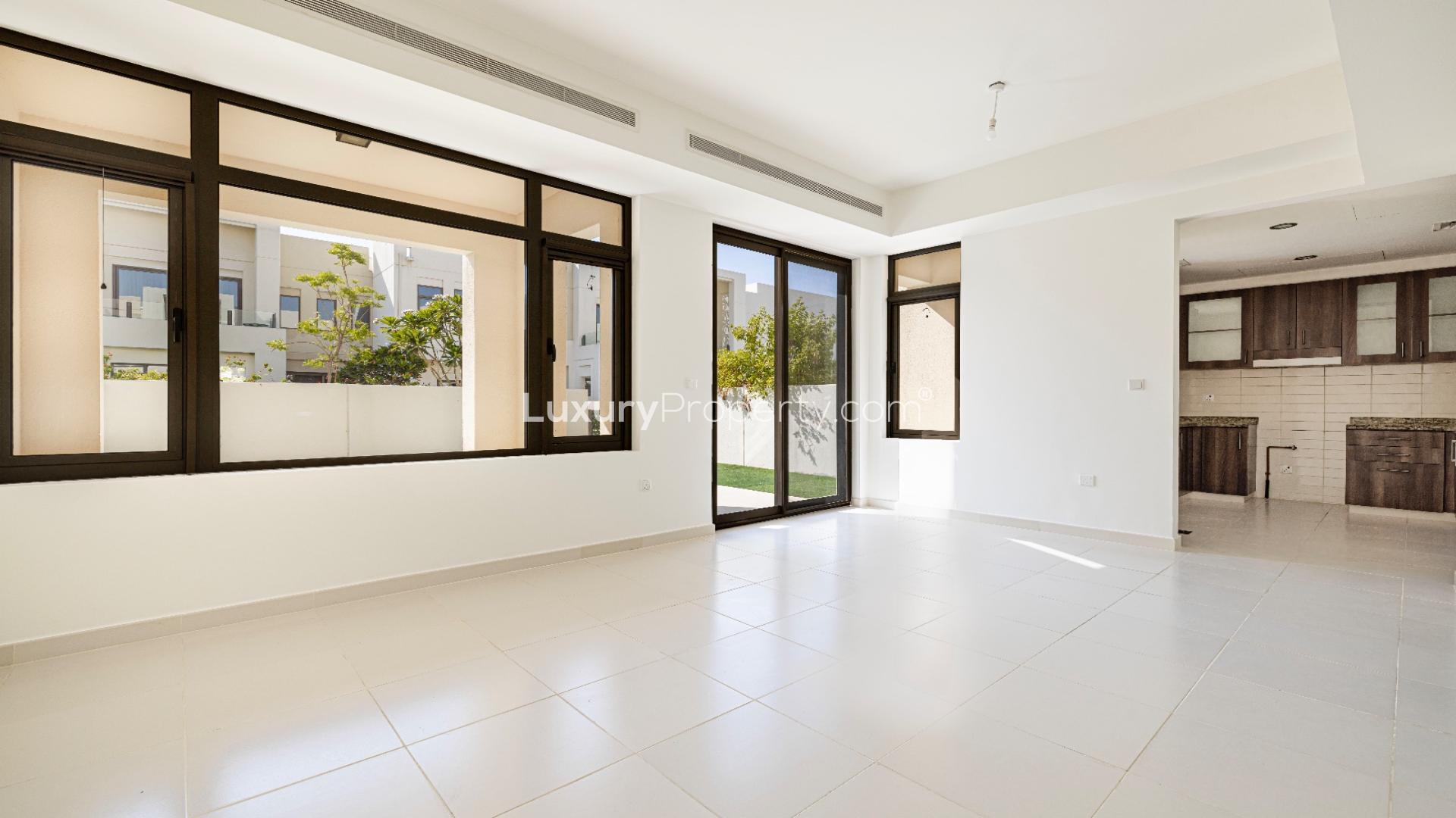 Elegant 3-bedroom villa exterior with lush garden in Mira Oasis, Reem community