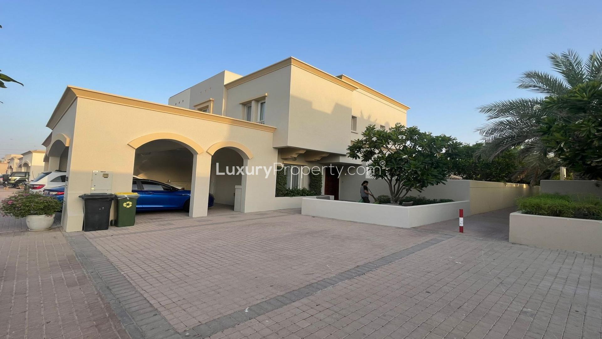 Spacious 3-bedroom villa exterior with driveway in The Springs, Emirates Living for sale