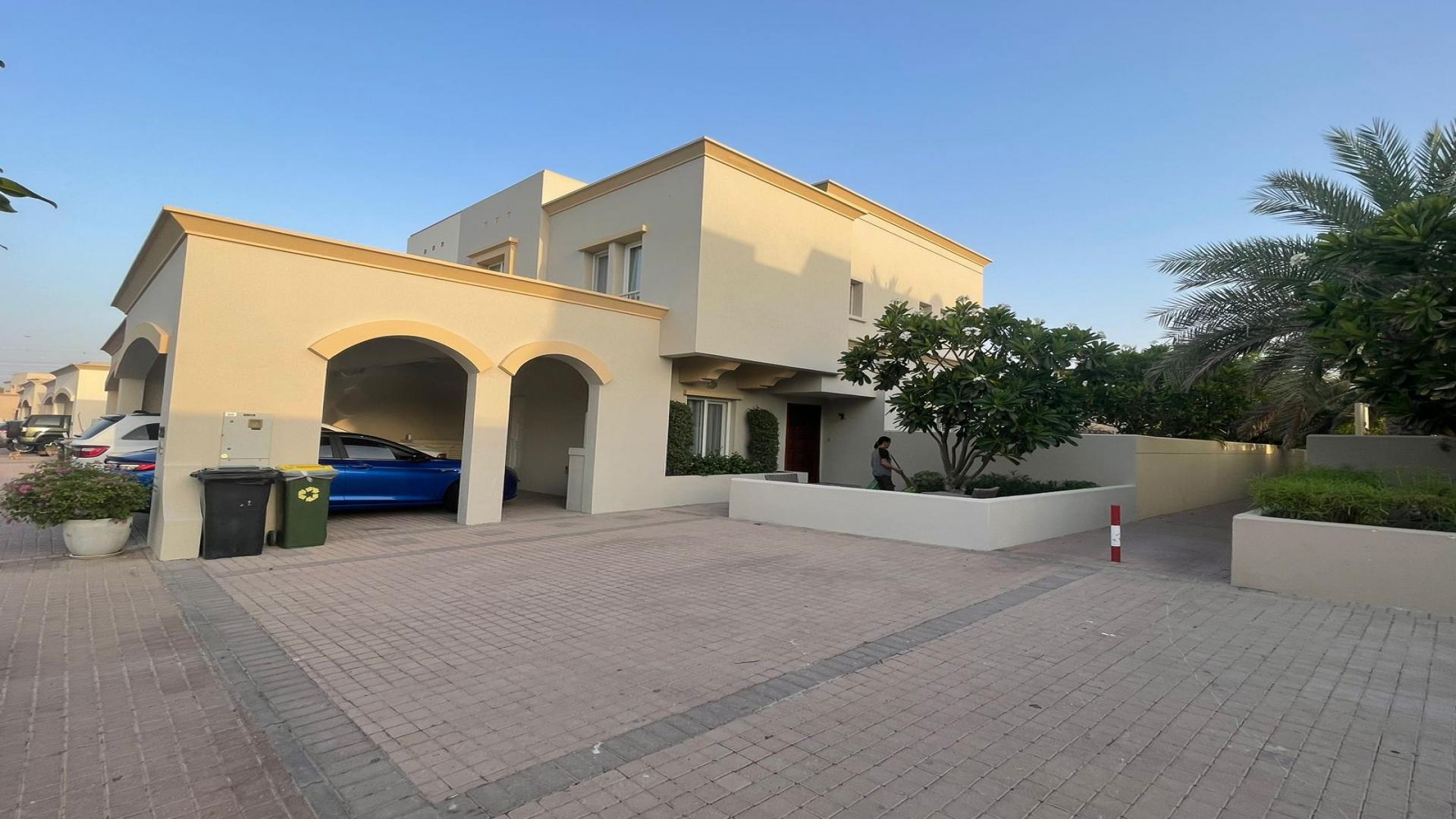 Spacious 3-bedroom villa exterior with driveway in The Springs, Emirates Living for sale