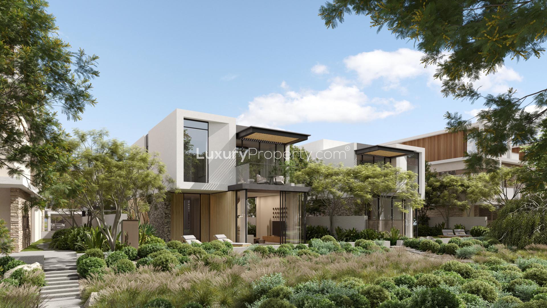 Modern living room in villa at The Acres, Dubai Land with large windows and elegant decor