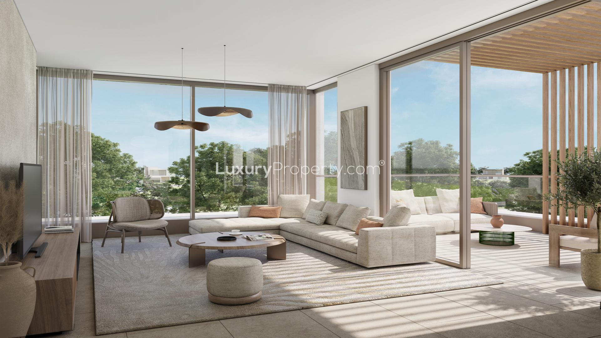 Modern three-bedroom villa exterior in The Acres, Dubai Land, lush landscape view