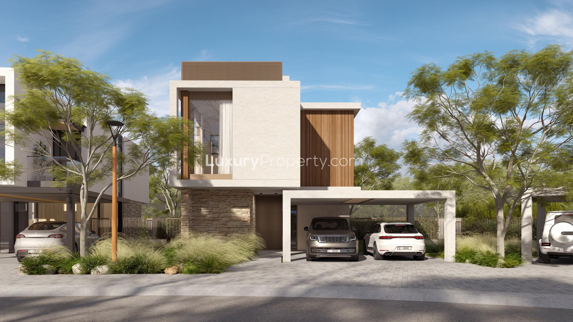 Modern living room in three-bed villa, The Acres, Dubai Land, with large windows and decor