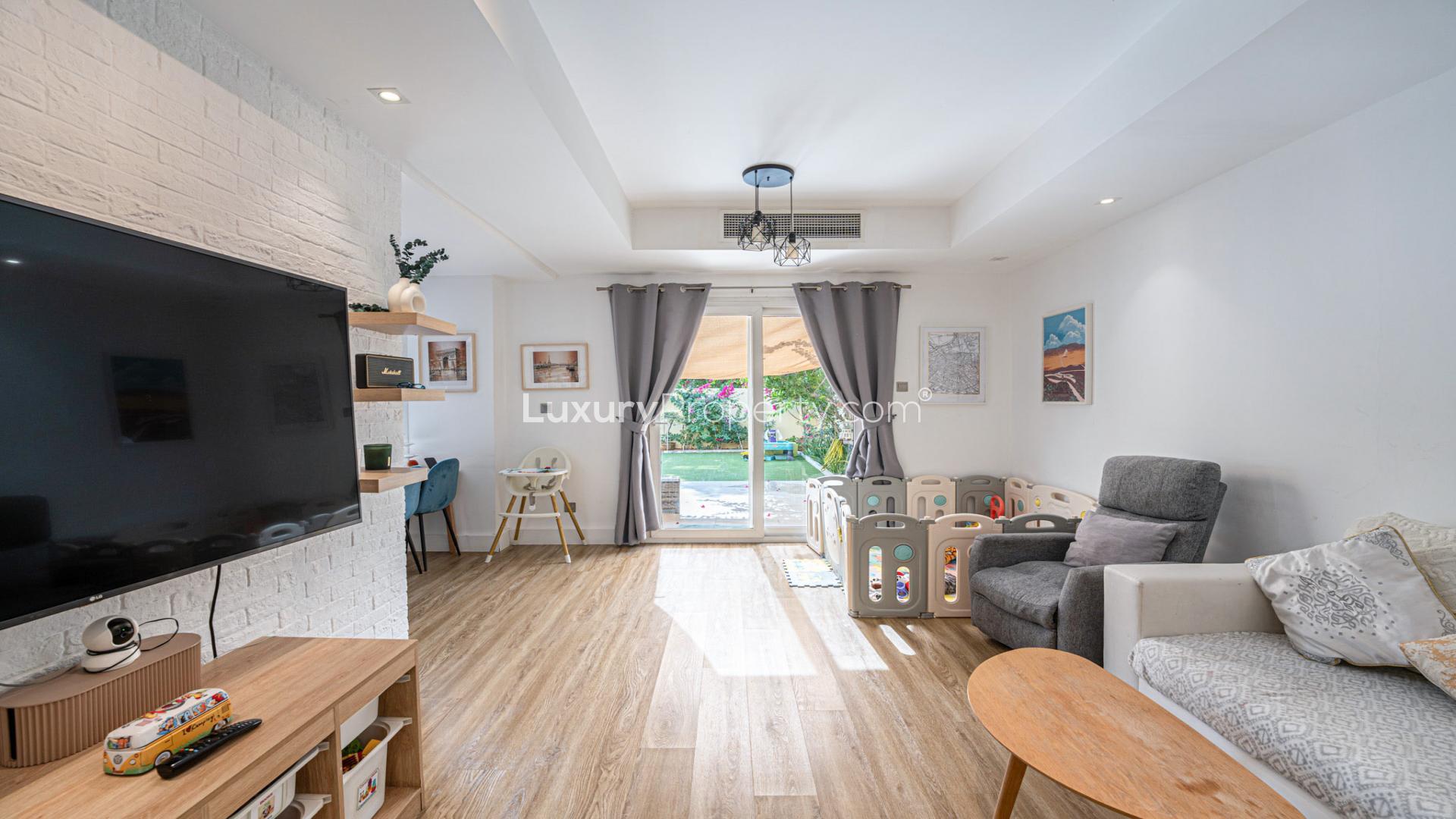 Backyard of 2-bed luxe villa in The Springs, Emirates Living with patio and garden