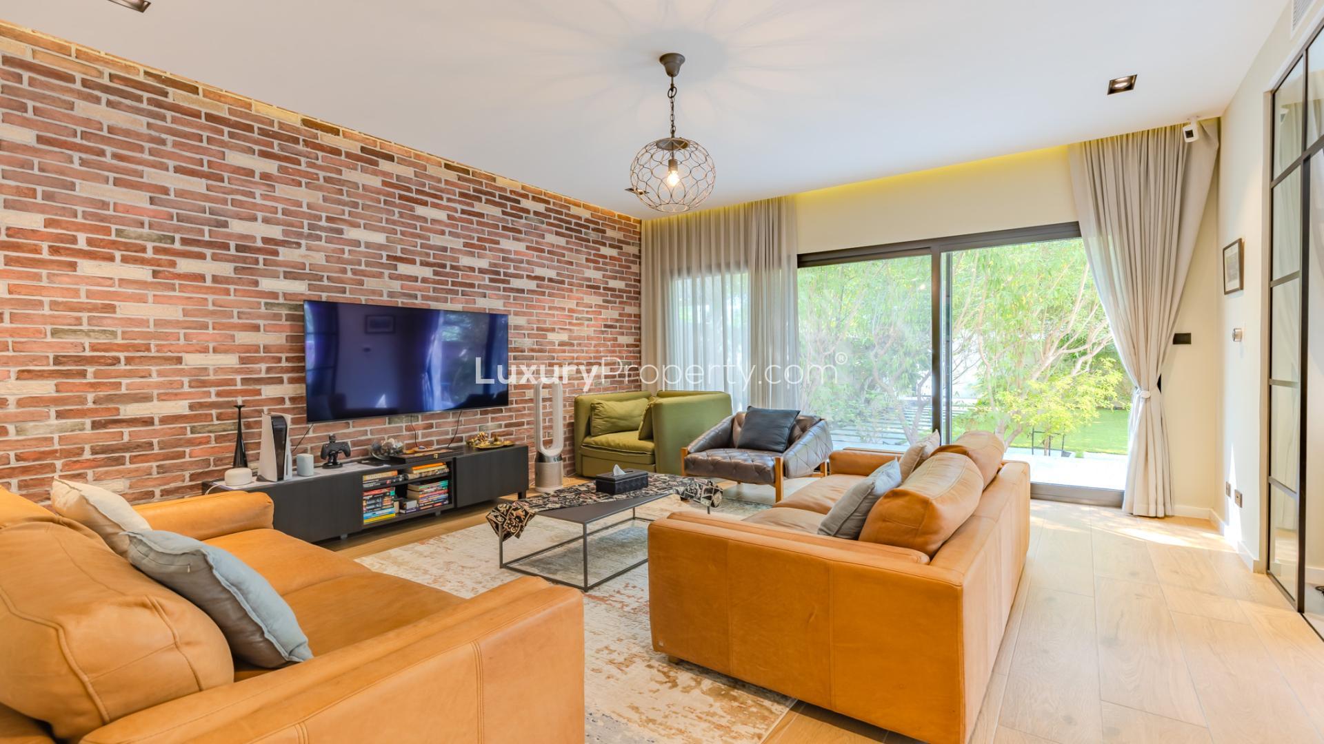 Dining room with modern decor, garden view, in upgraded villa, Springs 15, for sale