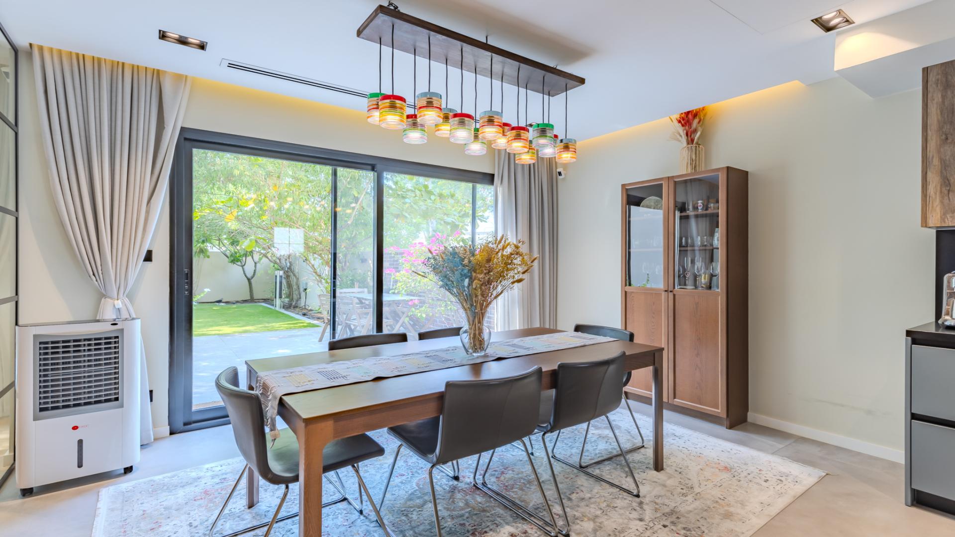 Modern kitchen in upgraded villa, Springs 15, featuring sleek design and spacious countertops