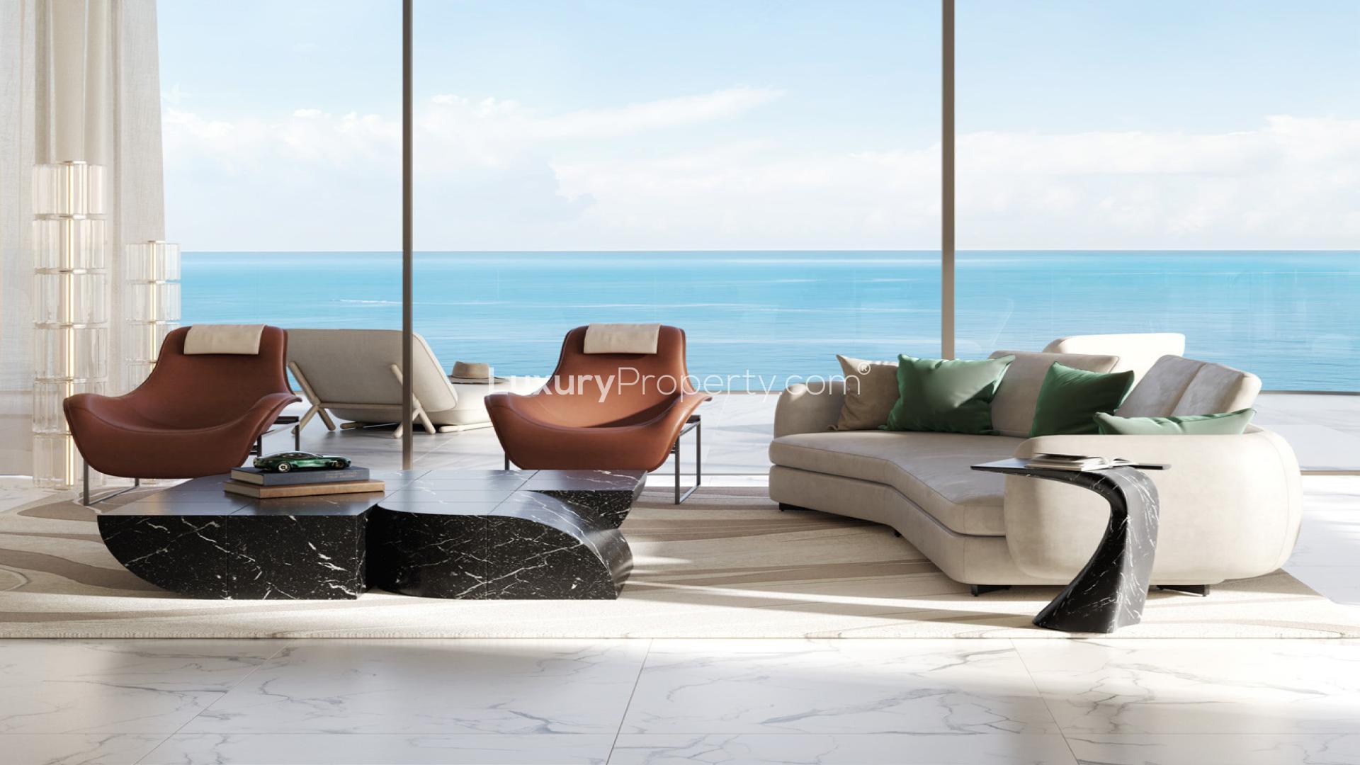Luxurious beachfront villa living room with ocean views, The Astera, Al Marjan Island