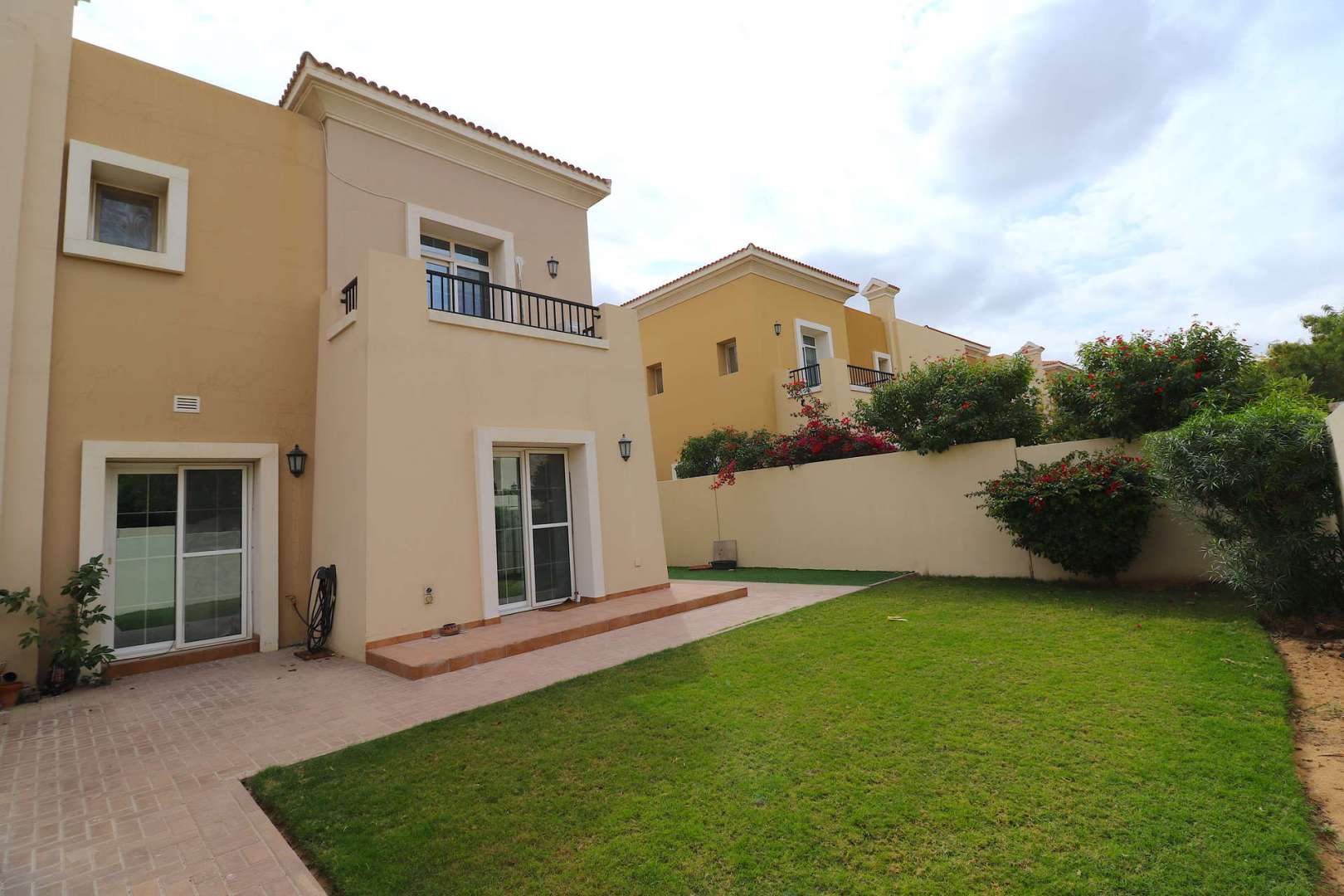 Exterior view of Al Reem villa with garden, Arabian Ranches, three-bedroom property for sale