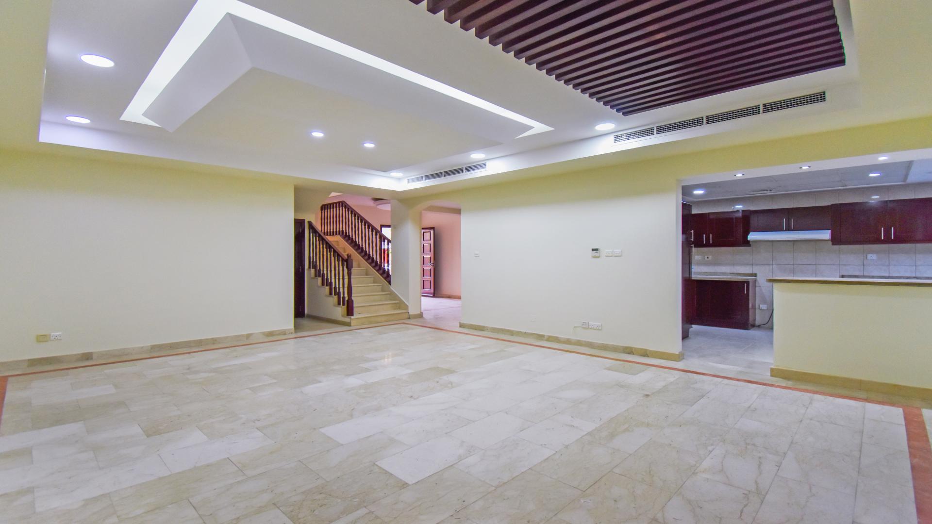Upgraded three-bedroom villa exterior with private parking in Al Reem, Arabian Ranches