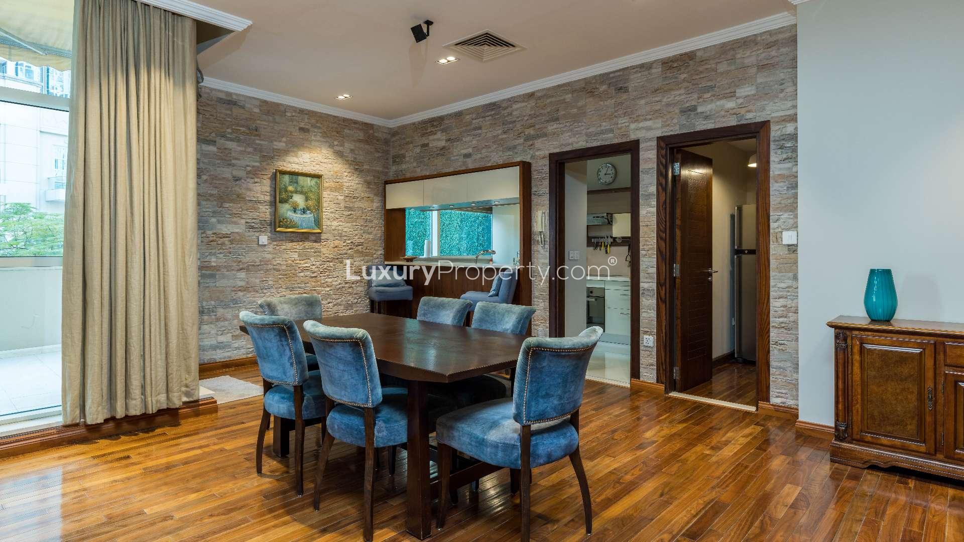 Dining area in vacant Al Sahab 1 villa, Dubai Marina, featuring elegant decor and seating