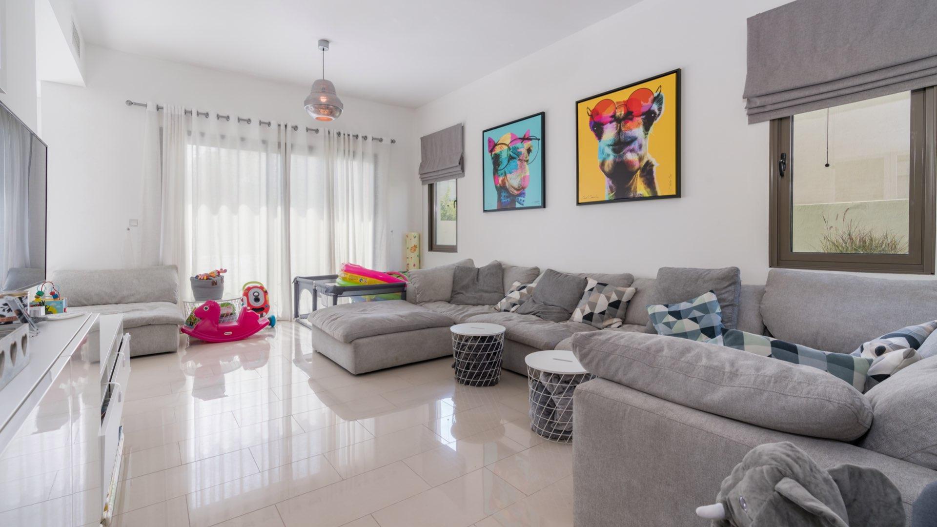 Spacious three-bedroom villa in Azalea, Arabian Ranches 2, featuring modern design and lush landscaping