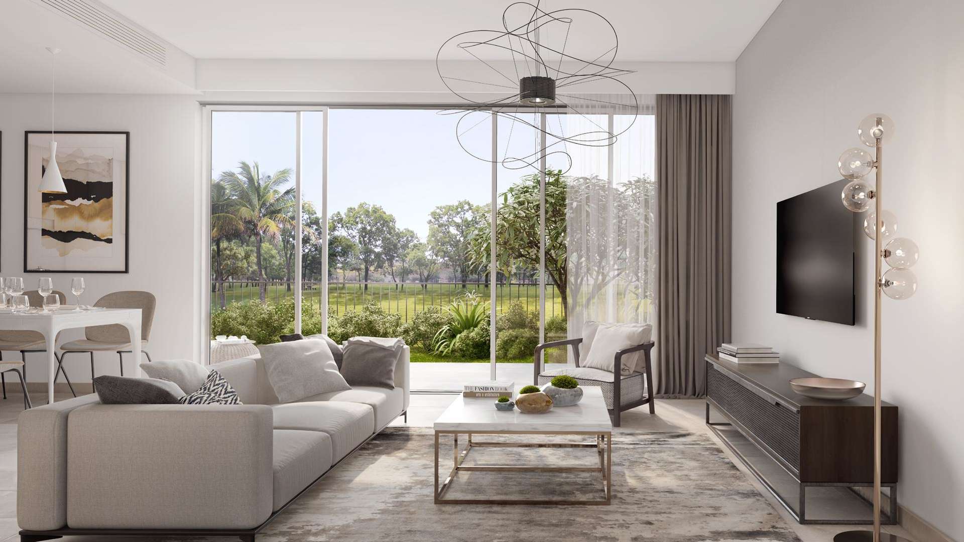 Contemporary three-bedroom townhouse exterior in Camelia, Arabian Ranches 2, with lush garden view