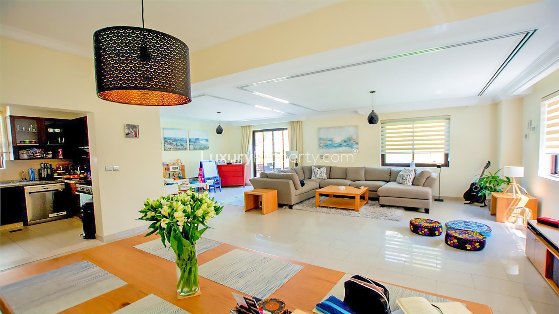 Beautiful villa backyard with green lawn, children's play area in Arabian Ranches 2, Casa