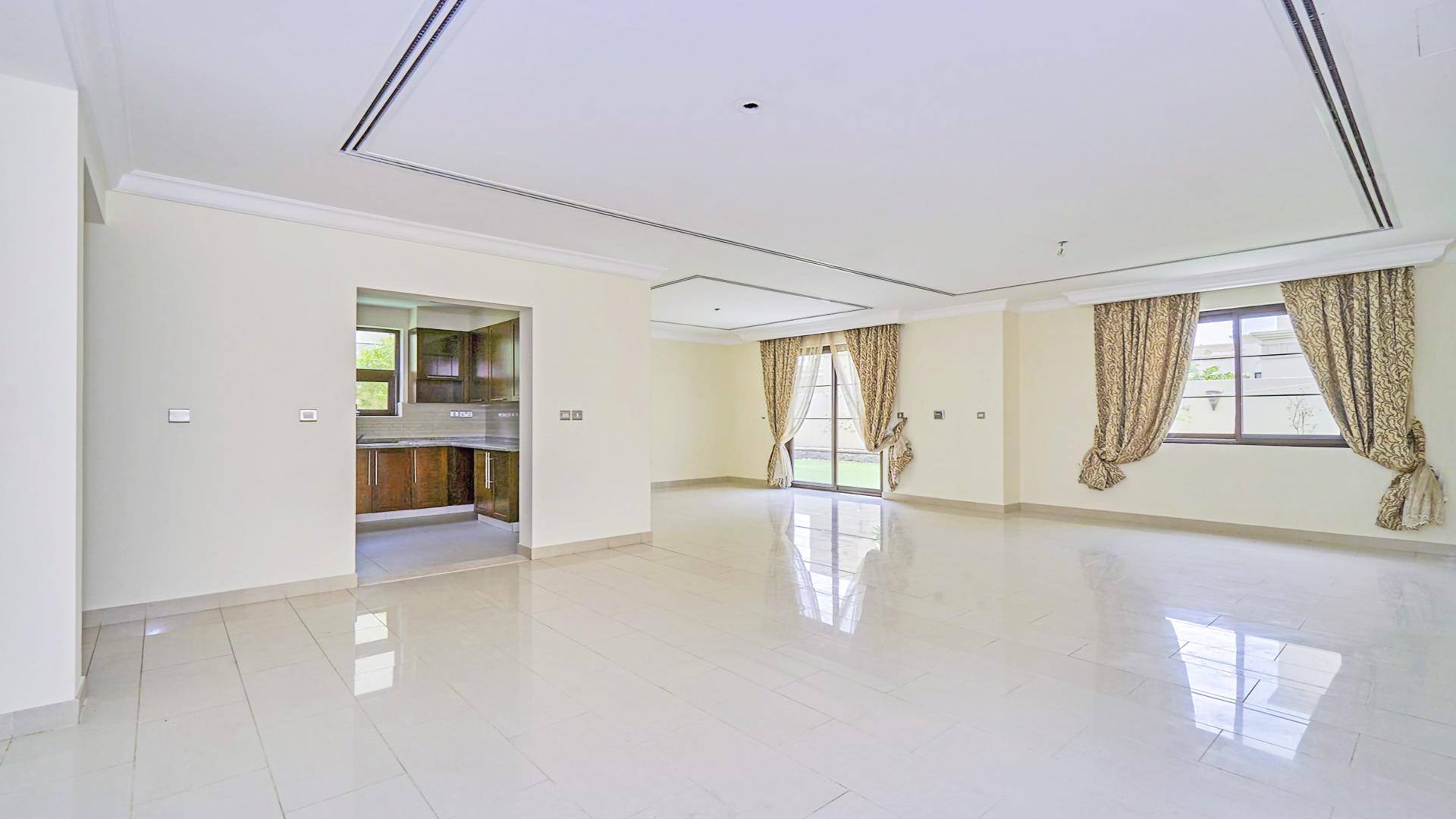 Elegant 3-bedroom villa exterior in Casa, Arabian Ranches 2, with lush greenery