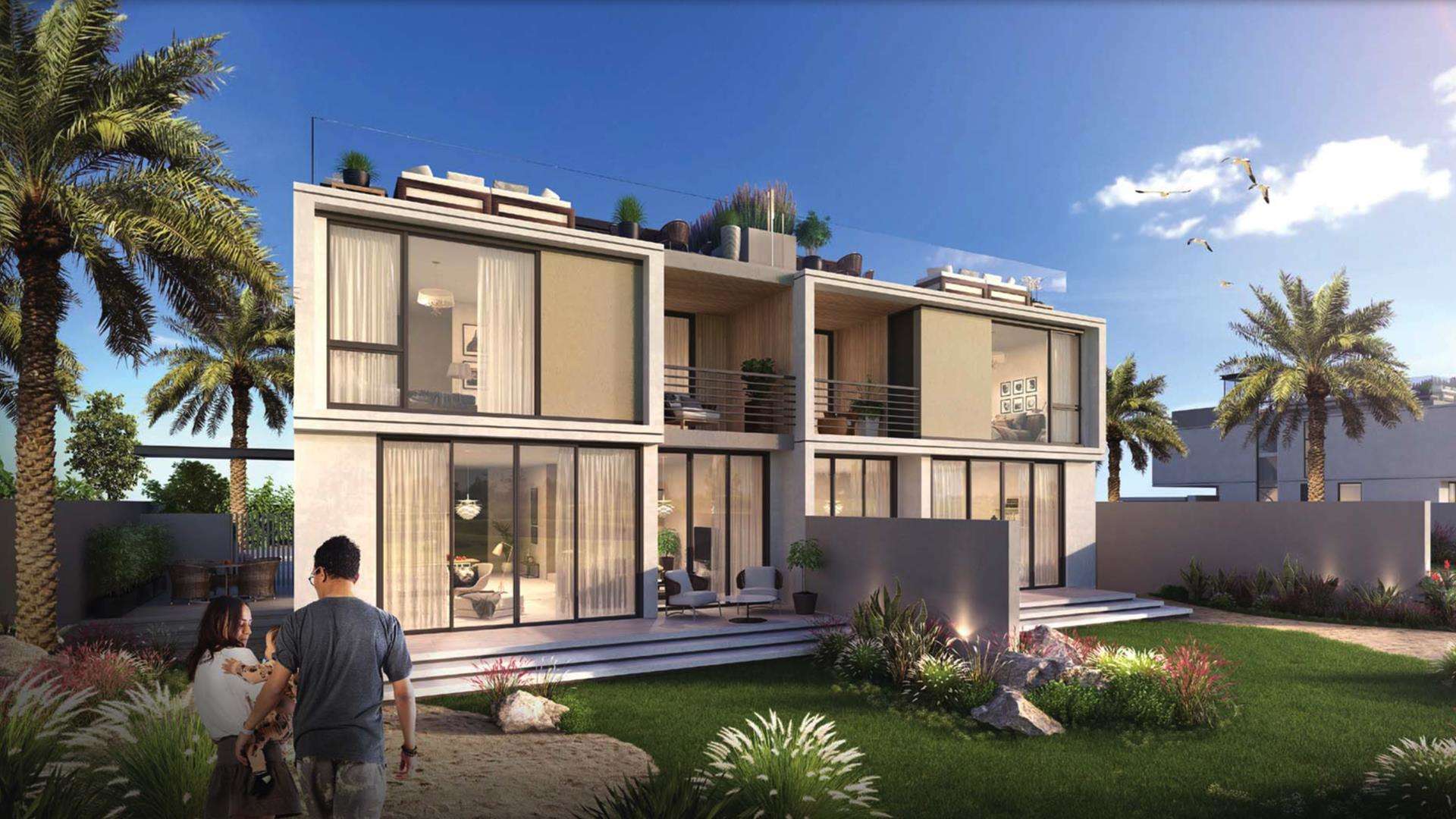 Outdoor pool area at Club Villas, Dubai Hills, featuring families enjoying leisure time together