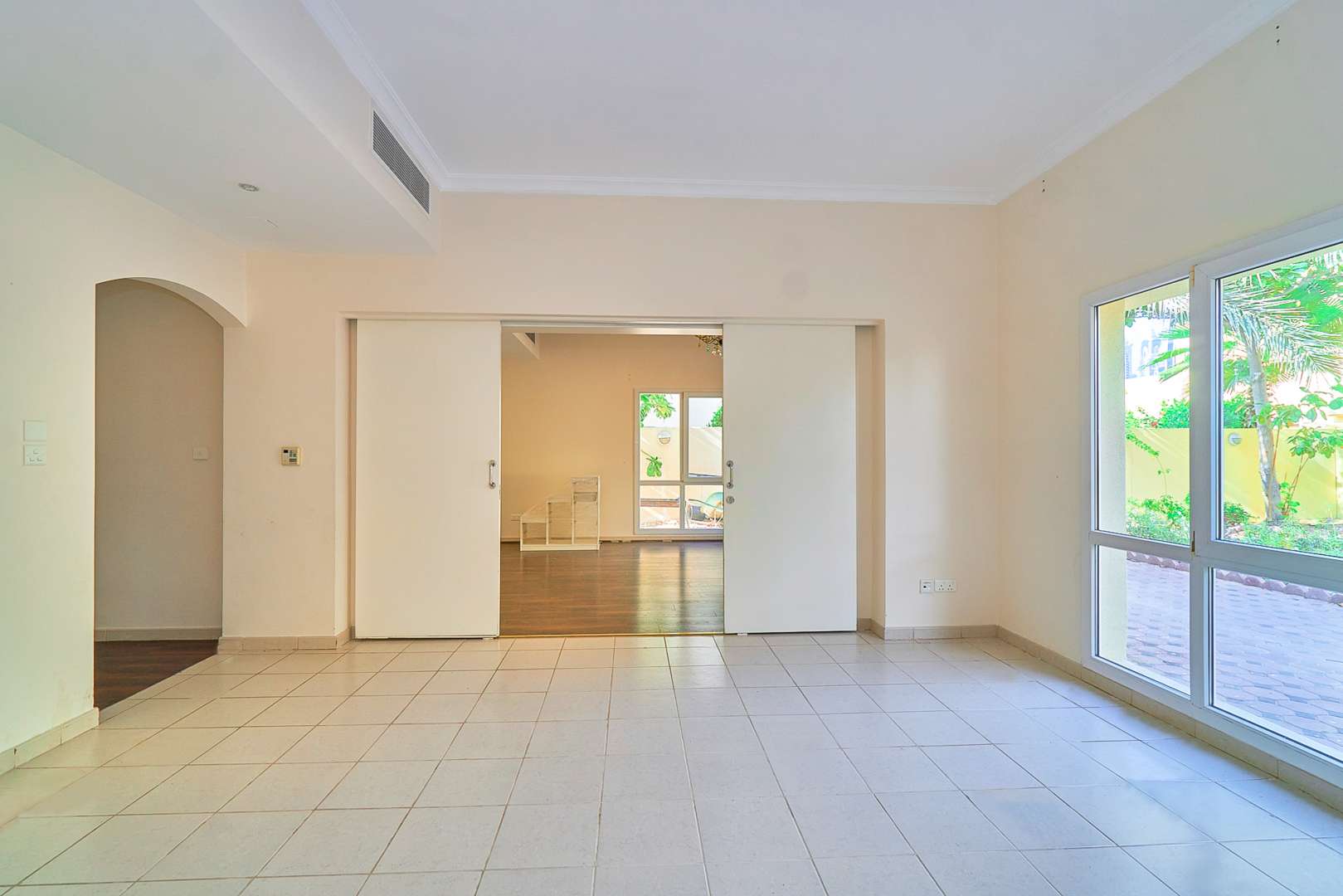 Bright living area with sliding doors to garden in Deema 2 villa, The Lakes