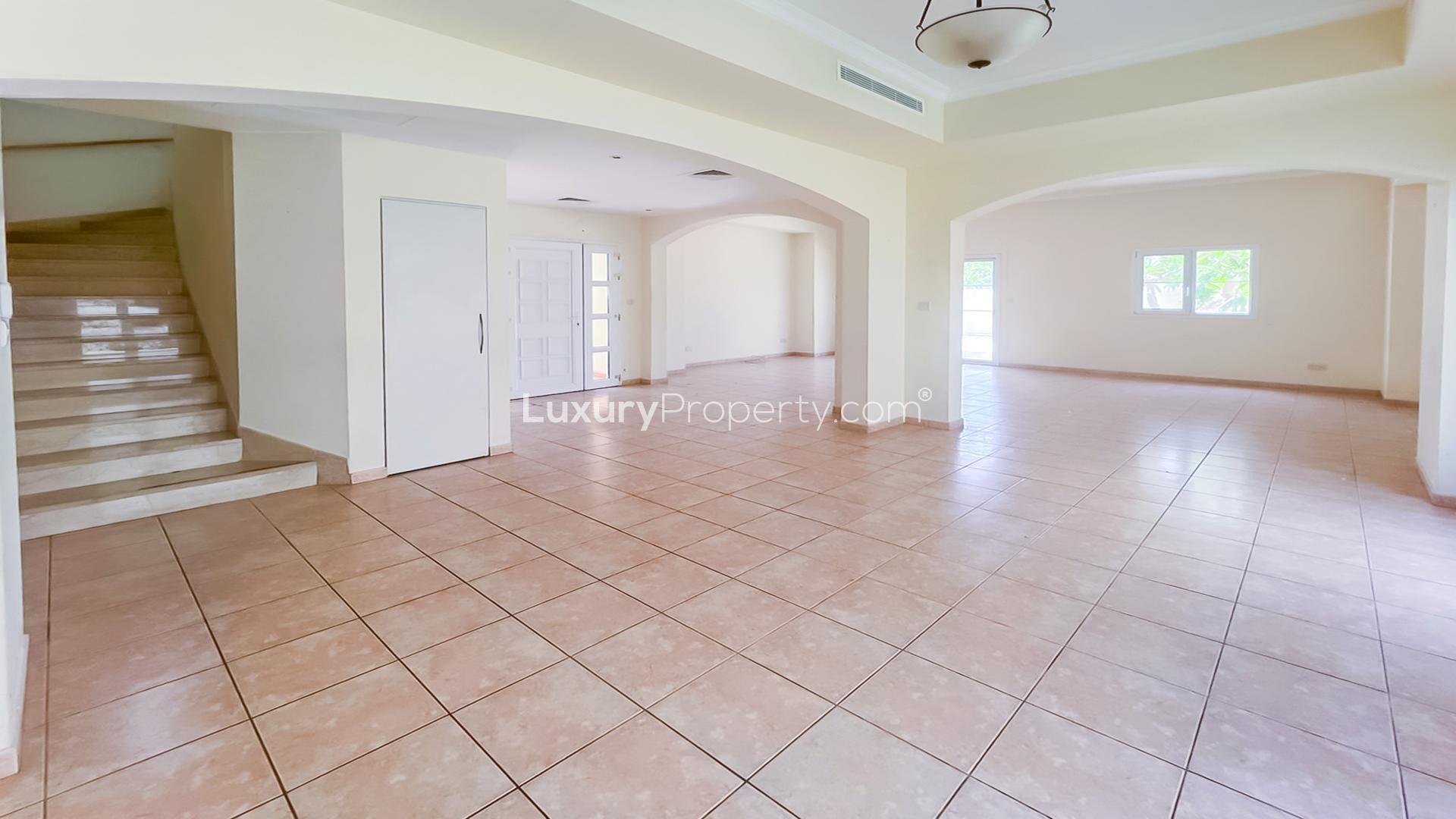 Spacious empty room with tiled floor in Deema villa, The Lakes community