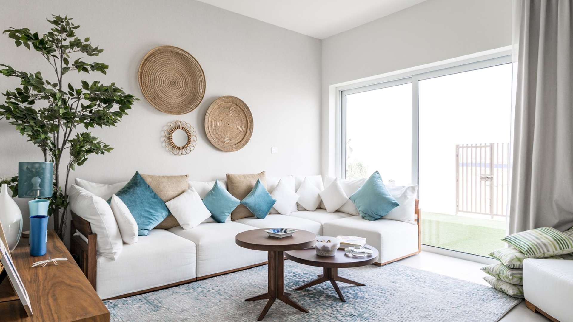 Modern kitchen in three-bedroom villa for sale at Golf Links, featuring sleek white cabinetry