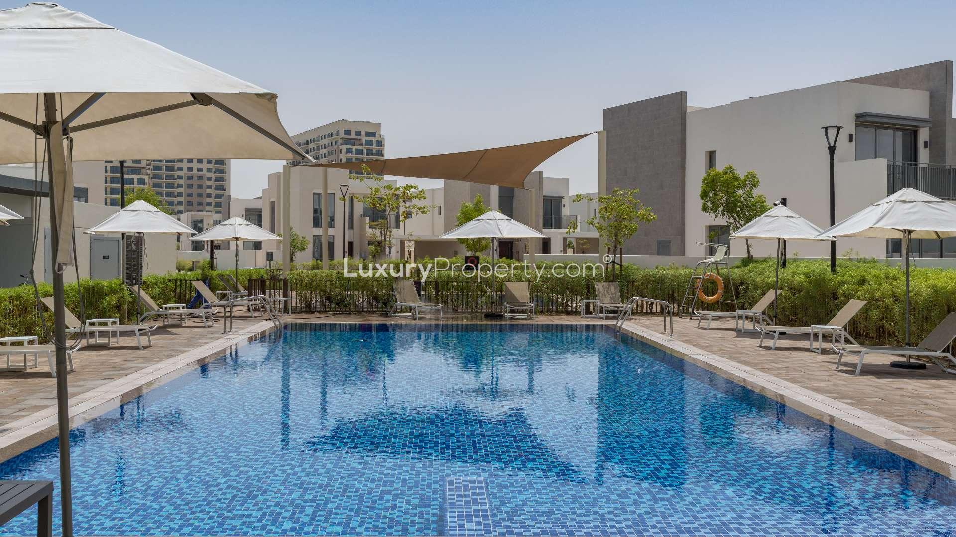 Exterior view of modern 3-bedroom villa for sale in Emaar South Golf Links