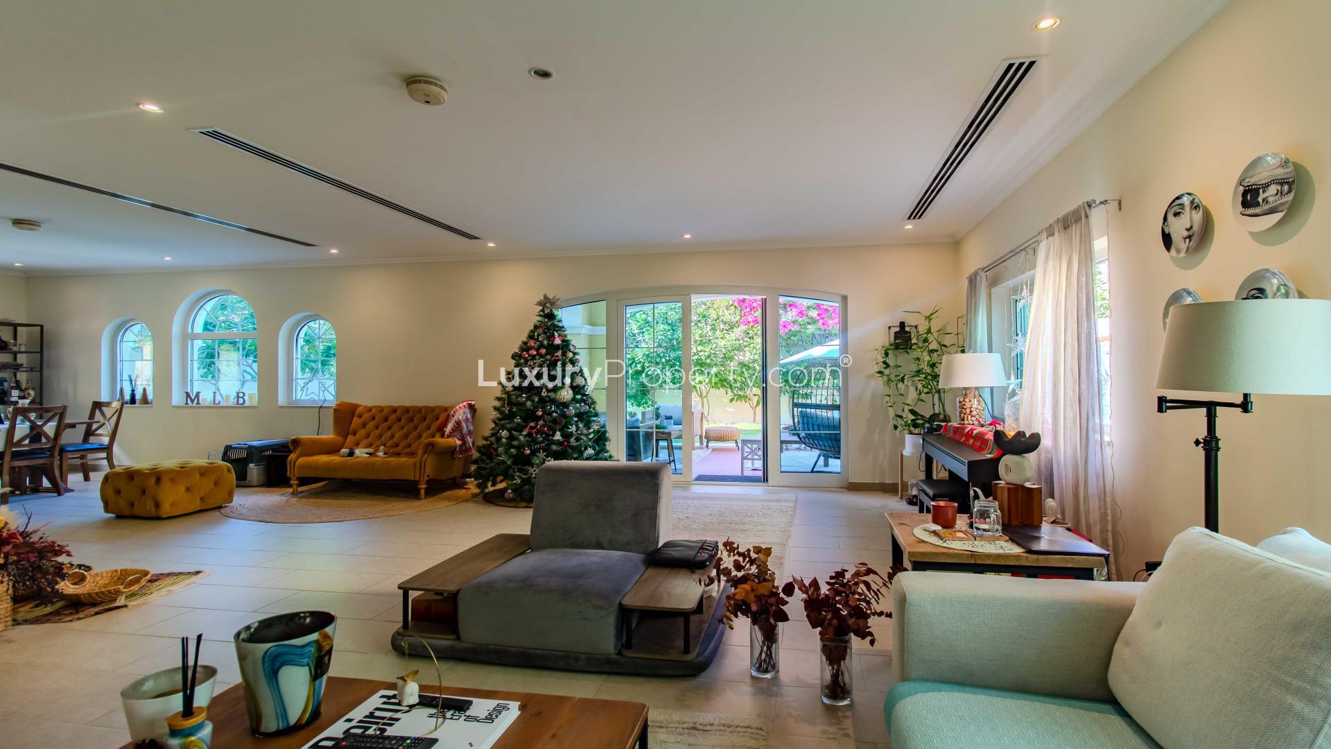 Luxurious living room in 3-bedroom Legacy Villa, Jumeirah Park, featuring elegant decor and furniture