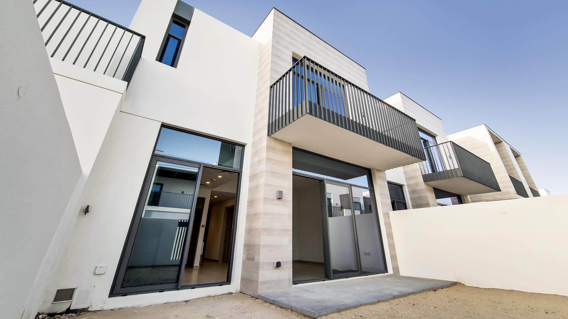 Modern kitchen and living area in 3-bedroom villa, Joy, Arabian Ranches III