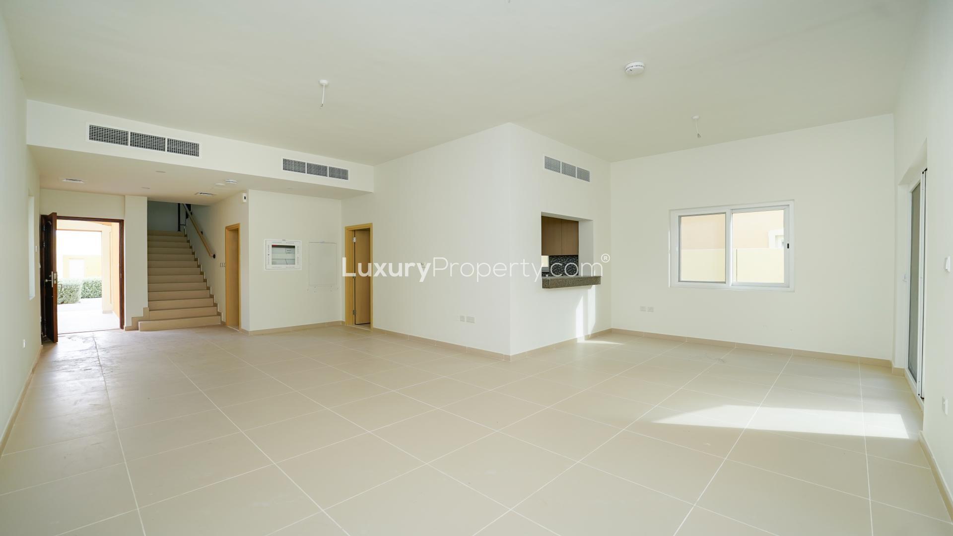 Lovely three-bedroom villa exterior in Villanova, Dubai Land, for sale