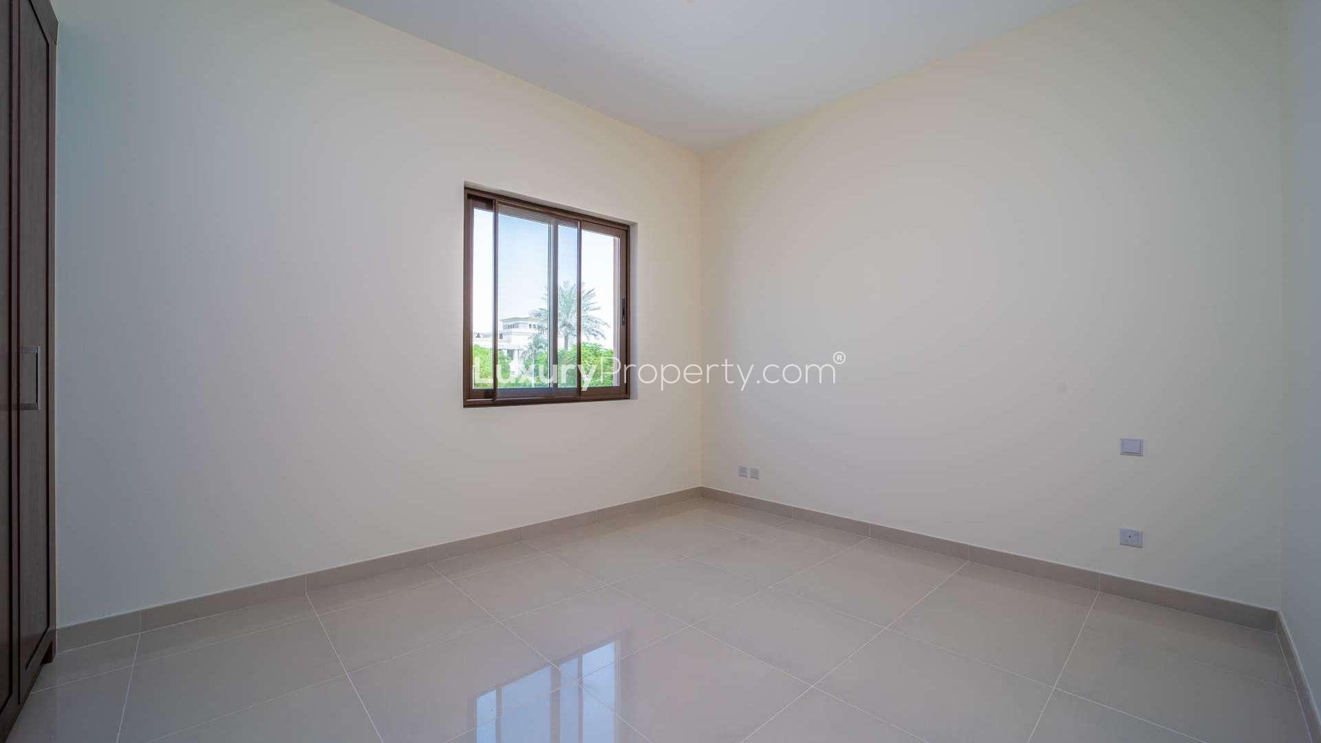Bright living room with large windows in Arabian Ranches 2 Lila villa for sale
