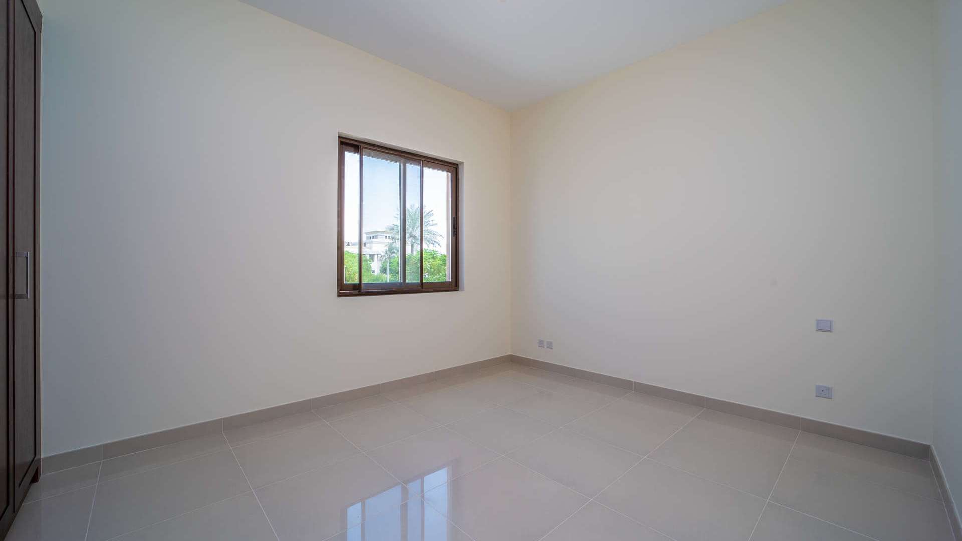 Bright living room with large windows in Arabian Ranches 2 Lila villa for sale