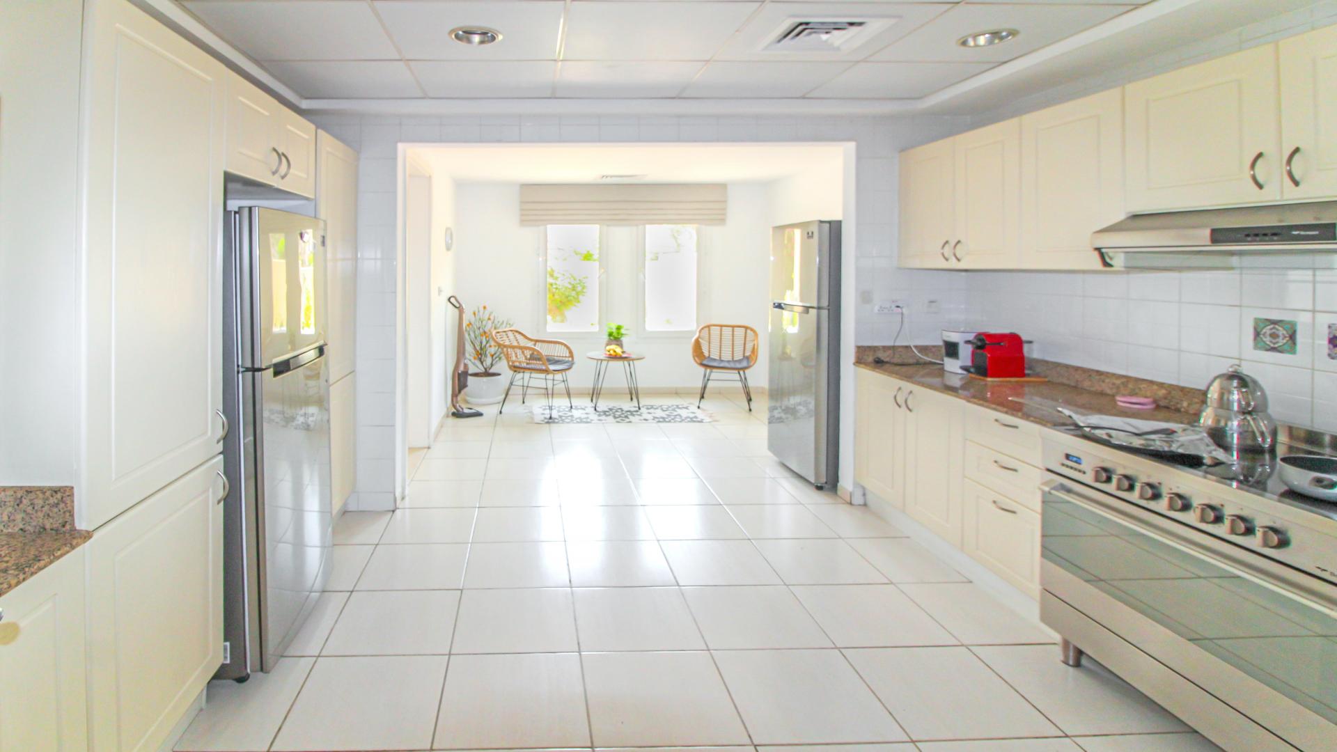 Living room of 3-bedroom villa in Maeen, The Lakes, with modern decor and piano