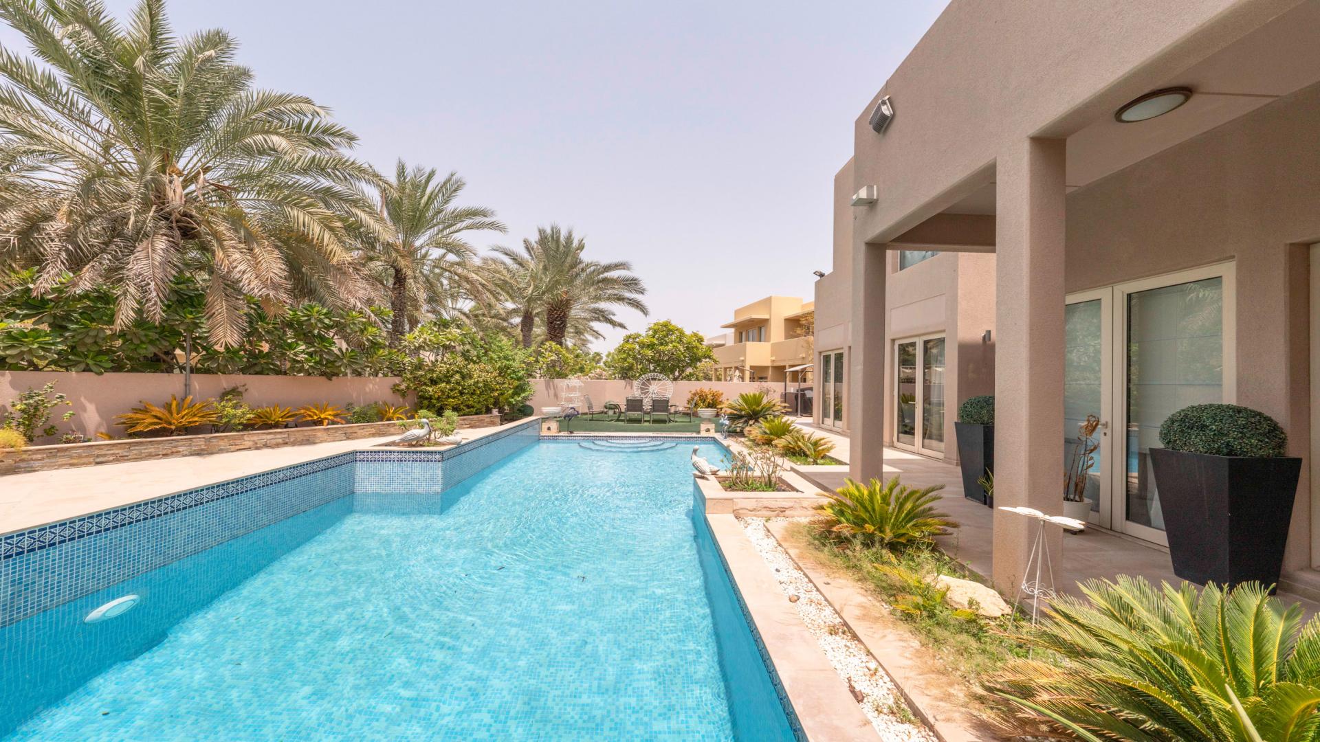 Luxurious living room in spacious Savannah villa, Arabian Ranches, with modern furnishings and decor