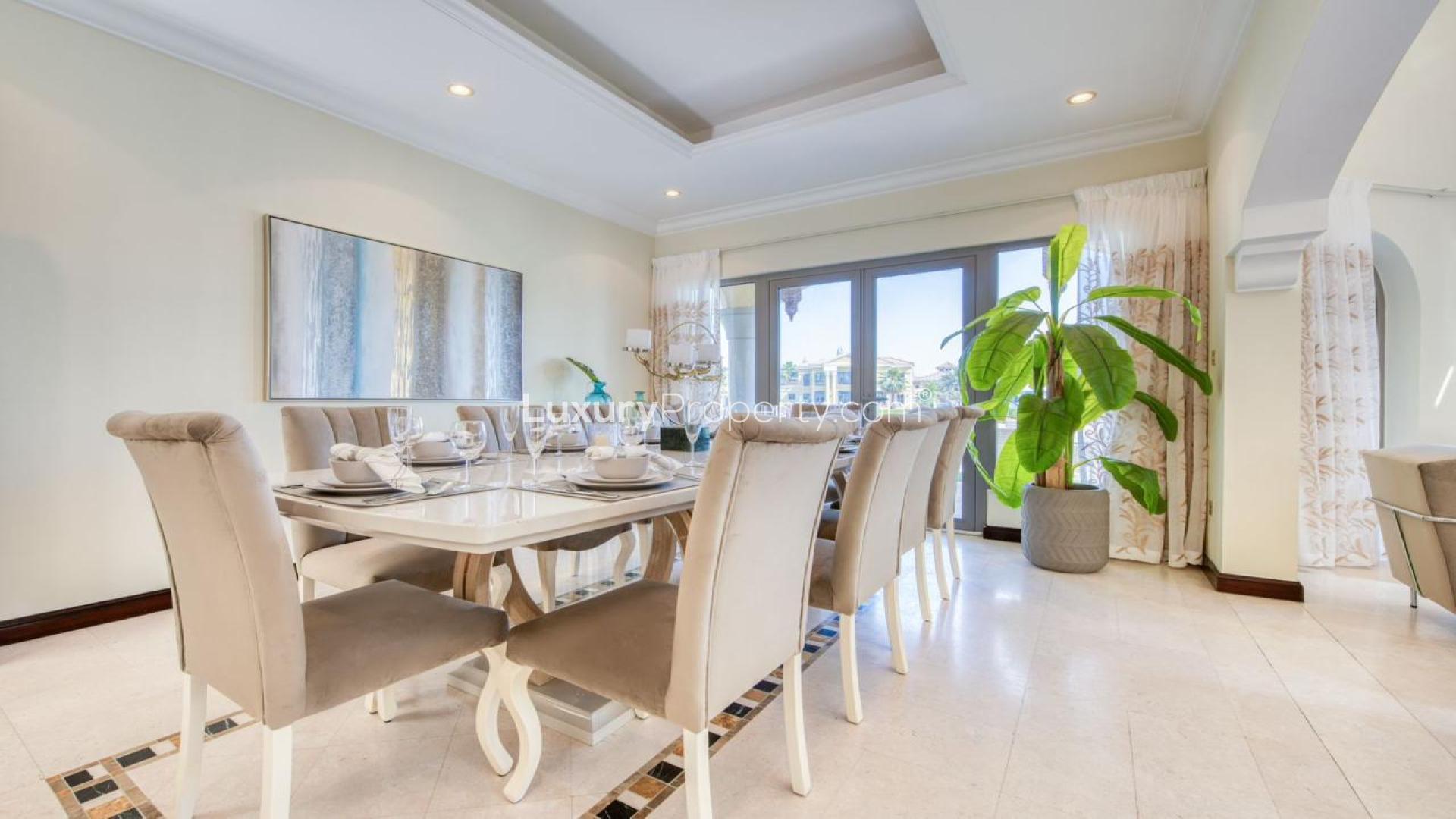 Luxurious living room in Palm Jumeirah Garden Homes villa, featuring elegant decor and seating