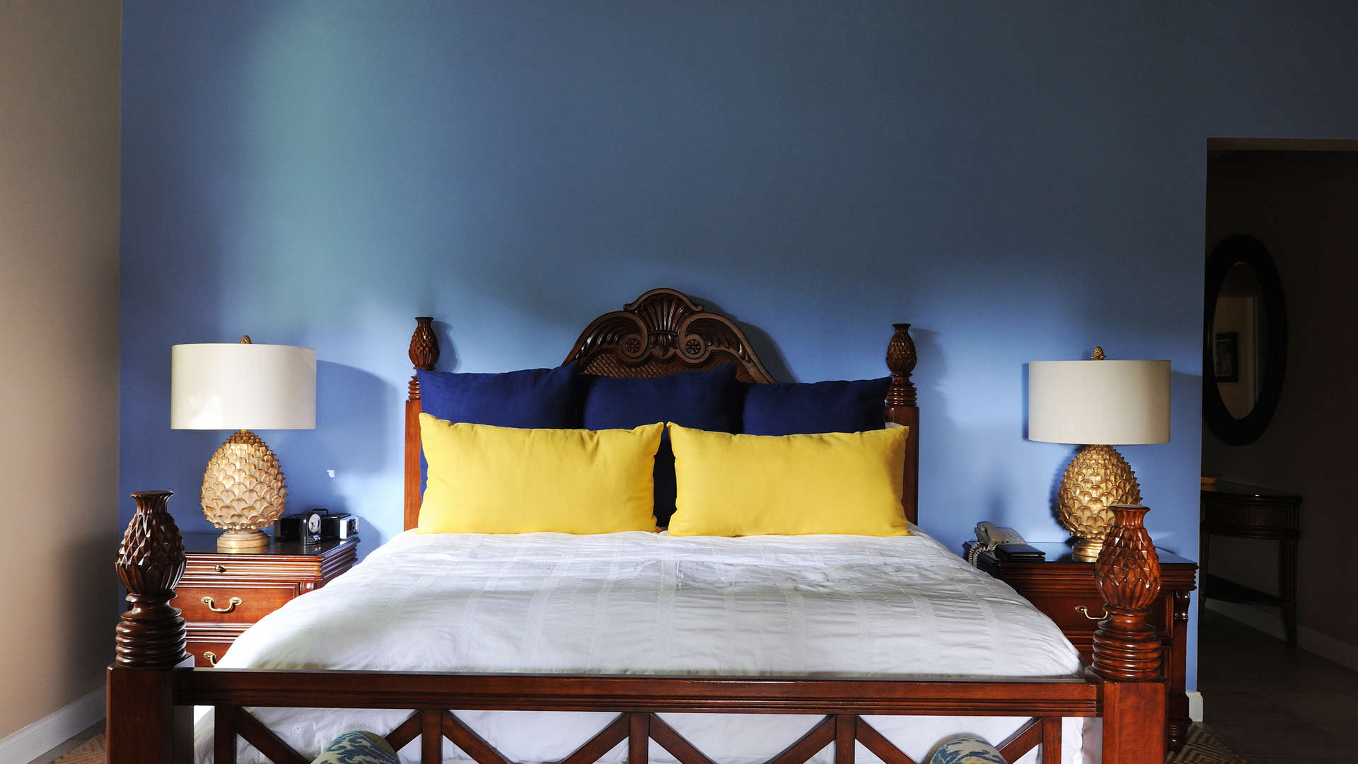 Stunning villa entrance with vibrant red doors at Nevis Estate Villas, St. Kitts & Nevis