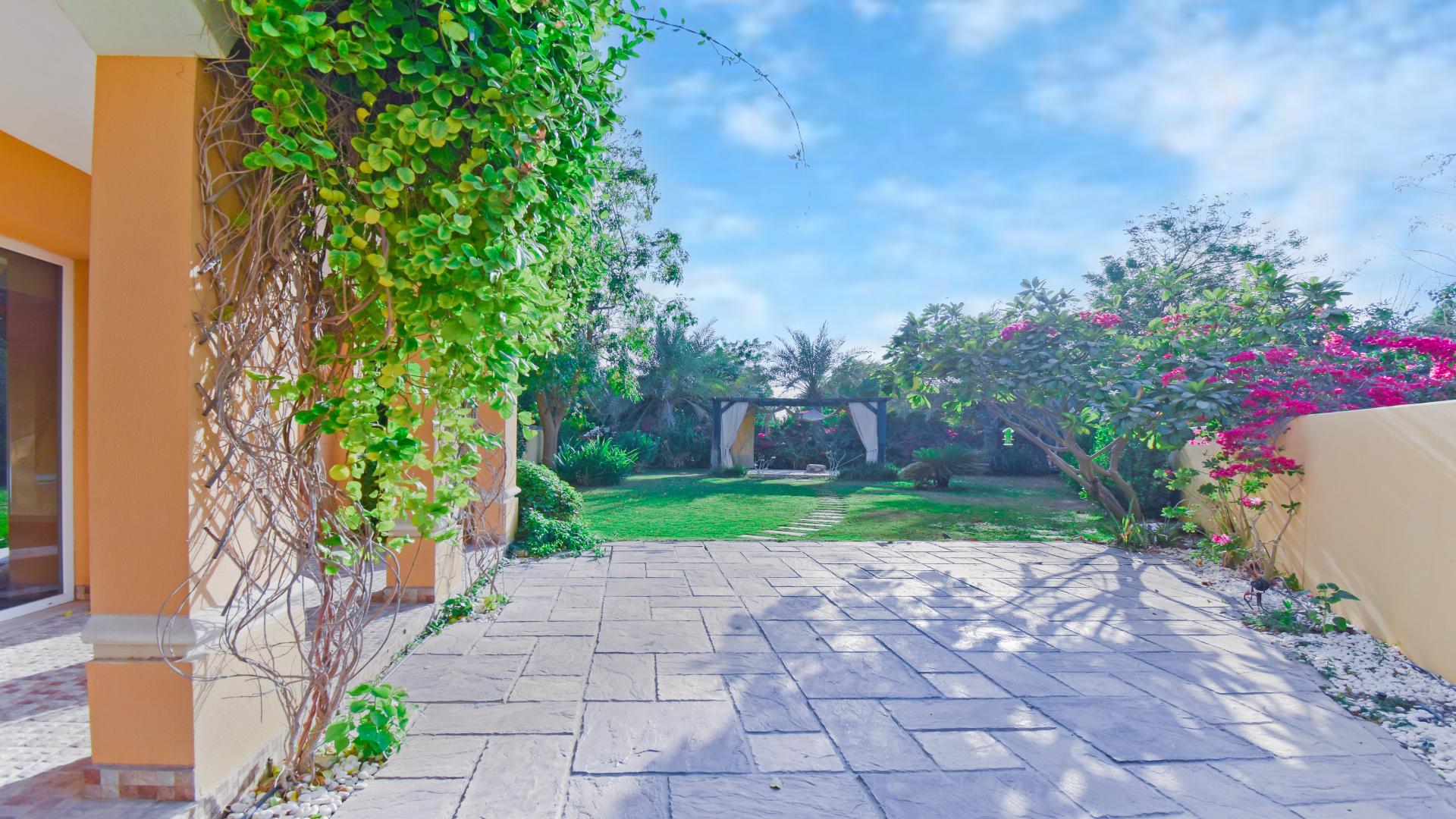 Bright living room with wooden floors in upgraded villa, Palmera, Arabian Ranches