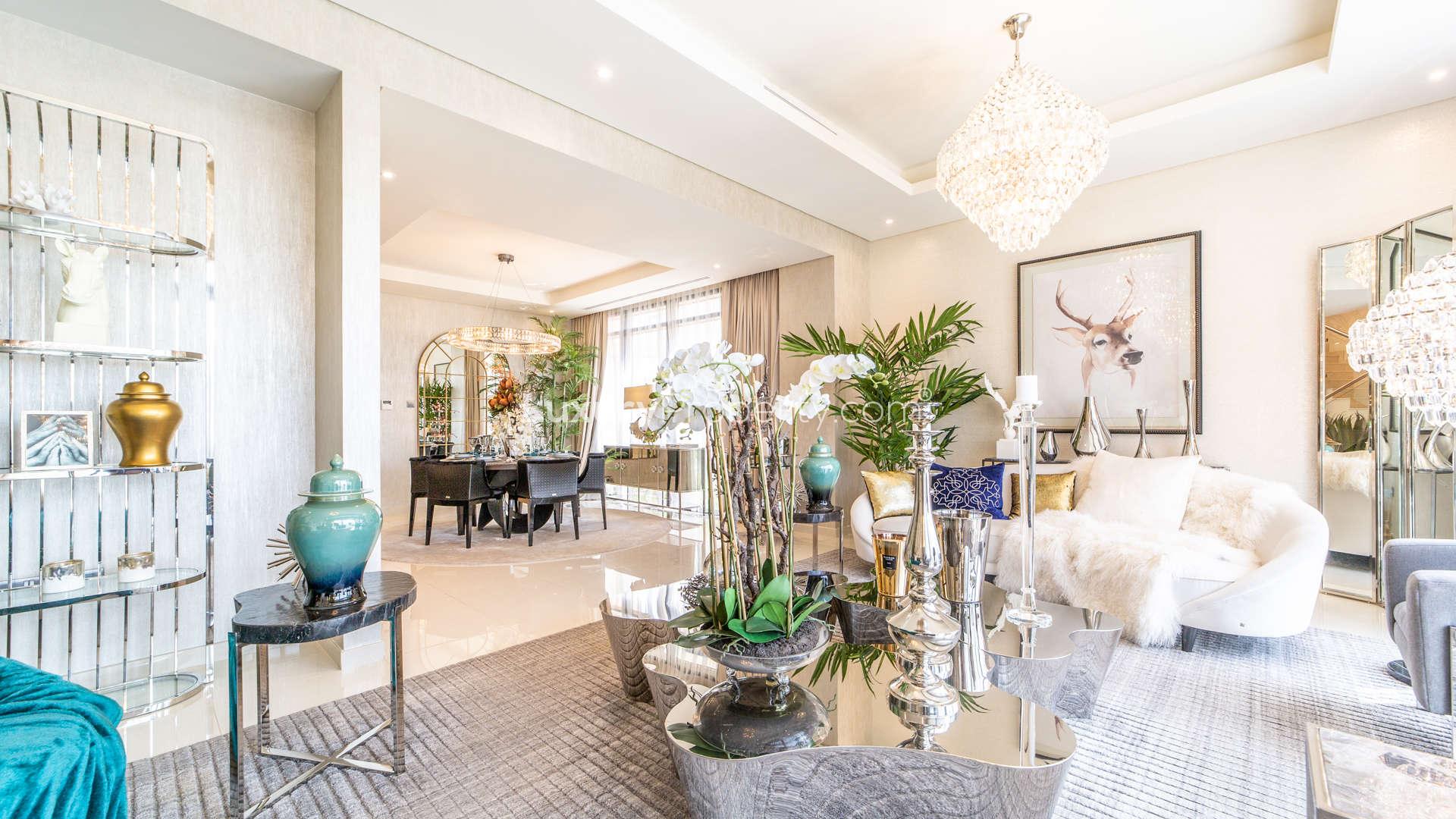 Sunny villa patio with garden and park views in Akoya Park, Damac Hills