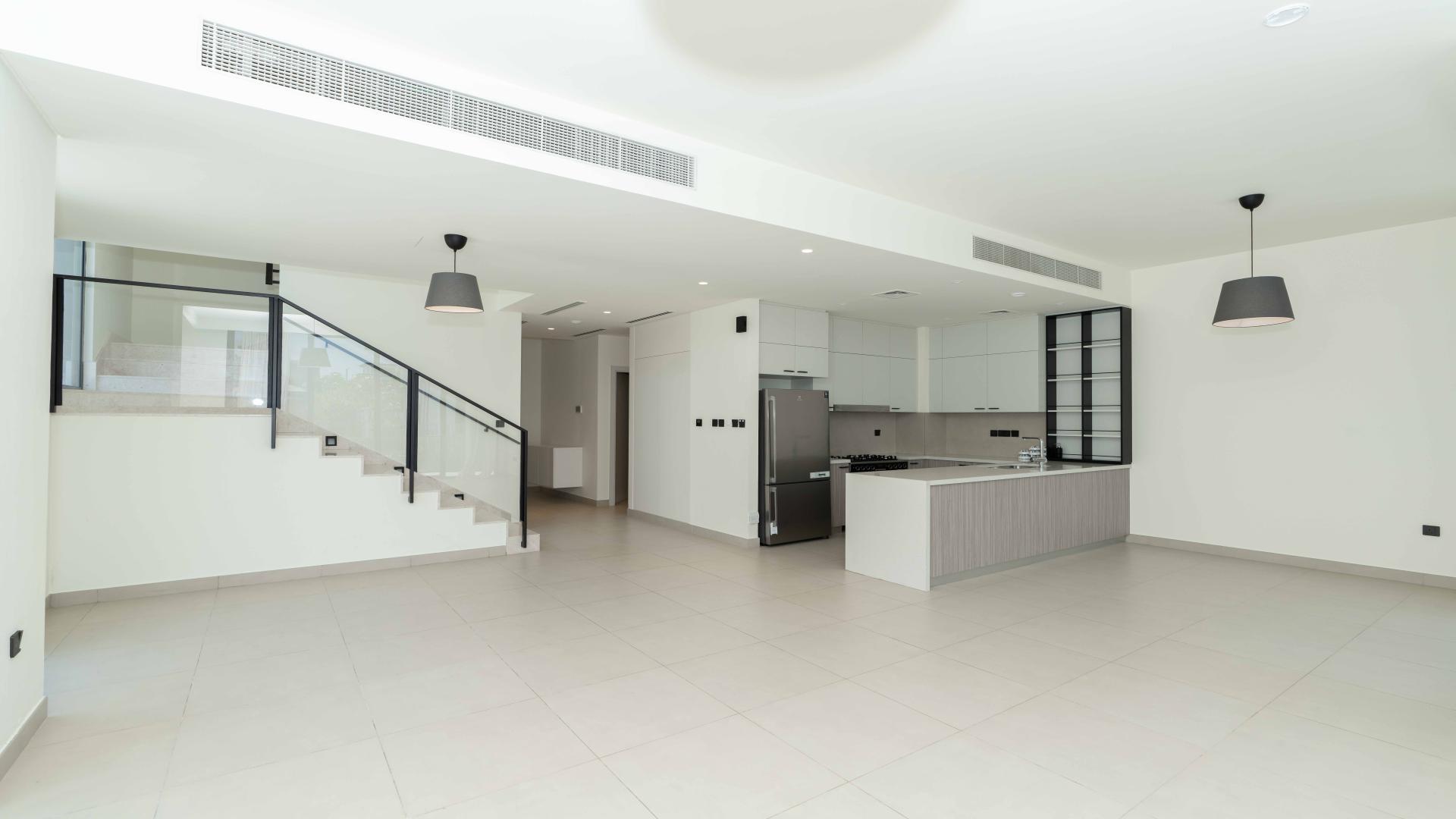 Golf Grove Villa exterior with driveway in Dubai Hills Estate, available for sale