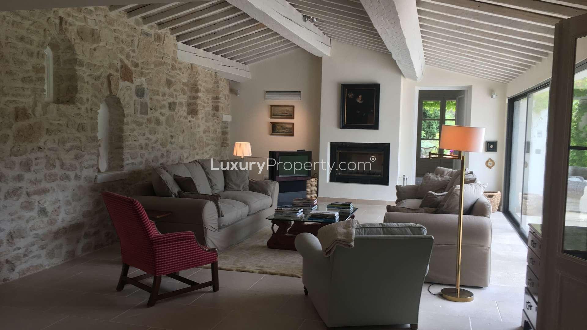 Living room in luxury St. Tropez villa, French Riviera, with elegant furnishings