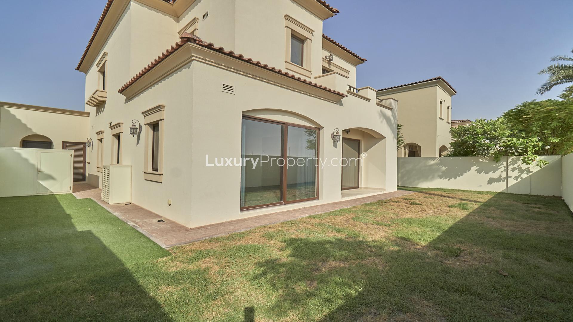 Bright living area in Samara standalone villa, Arabian Ranches 2, with large windows and tile flooring