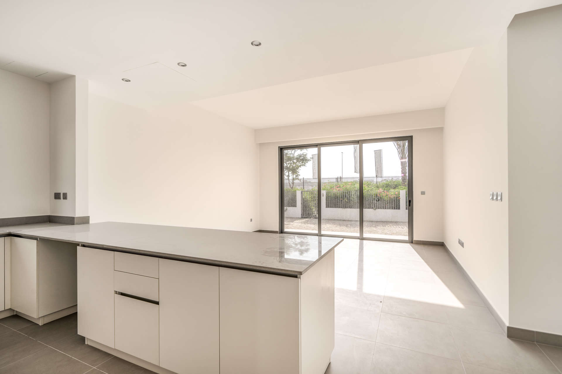 Open-plan kitchen with large windows in Sidra Villas, Dubai Hills Estate