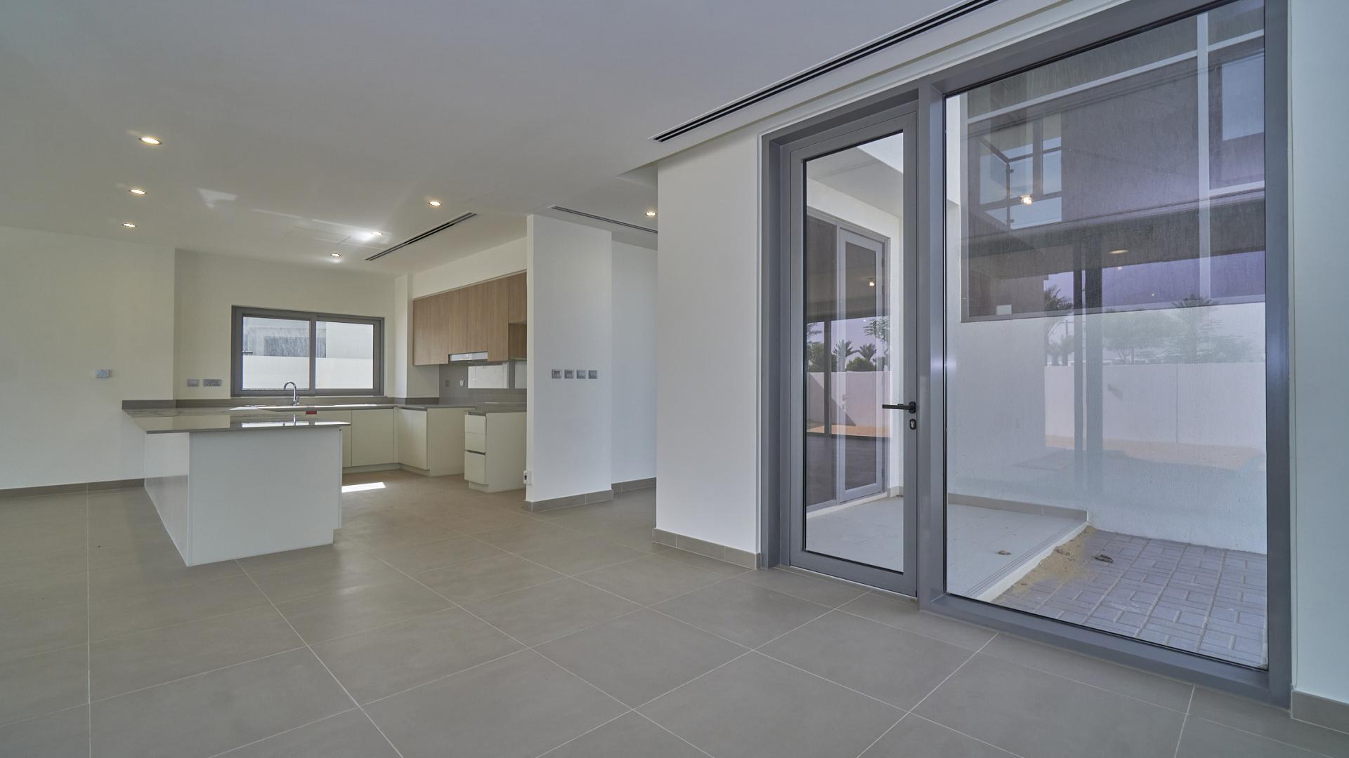 Modern villas in Sidra, Dubai Hills Estate, showcasing single row layout and landscaped surroundings