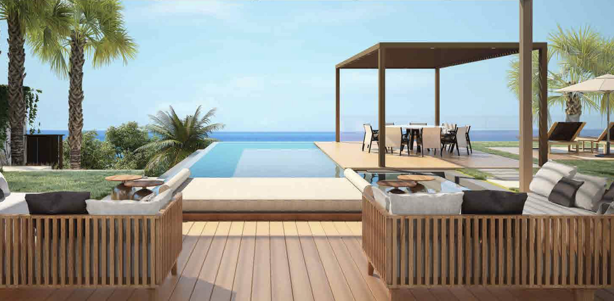 Aerial view of Silversands Hillside Villas, Grenada, overlooking turquoise waters and lush landscape