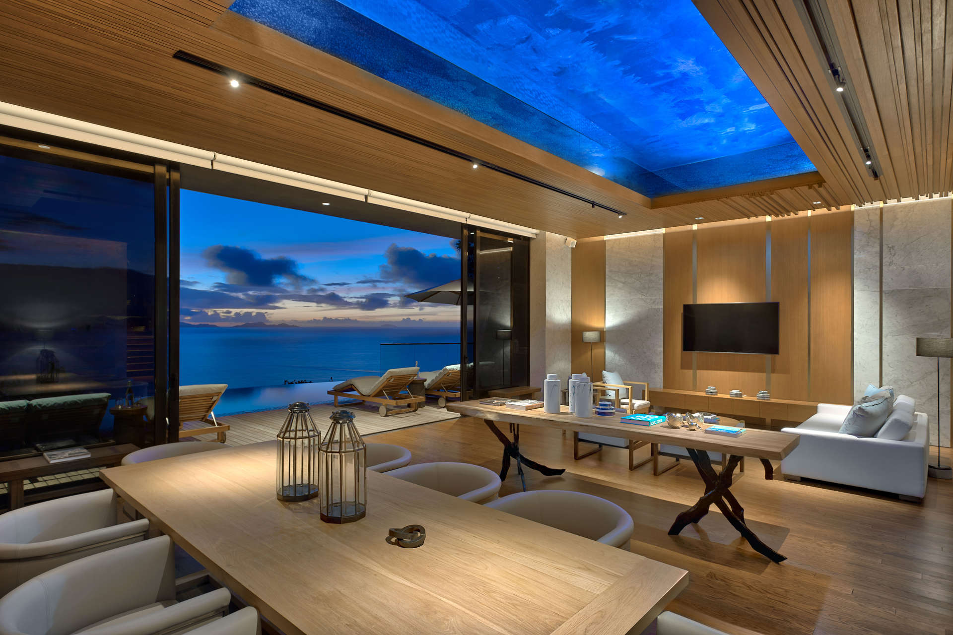 "Luxurious clifftop villa living room with ocean views, Felicite Island, Seychelles.",Luxurious living room in clifftop villa with ocean view, Felicite Island, Seychelles