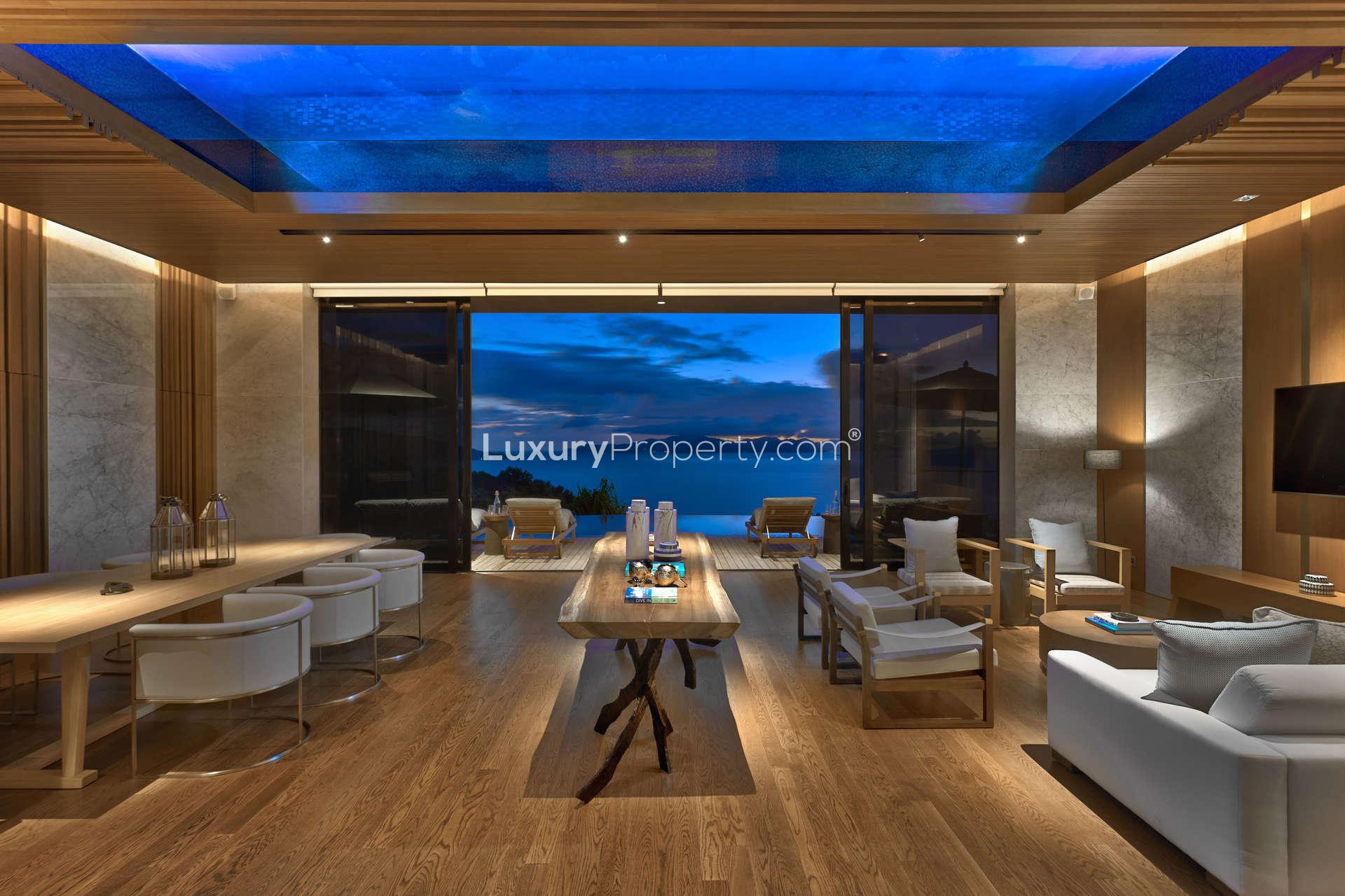 Luxurious open-plan villa living room with ocean view on Felicite Island, Seychelles