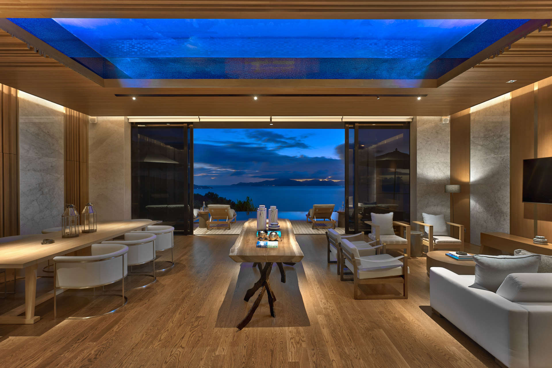 Luxurious open-plan villa living room with ocean view on Felicite Island, Seychelles