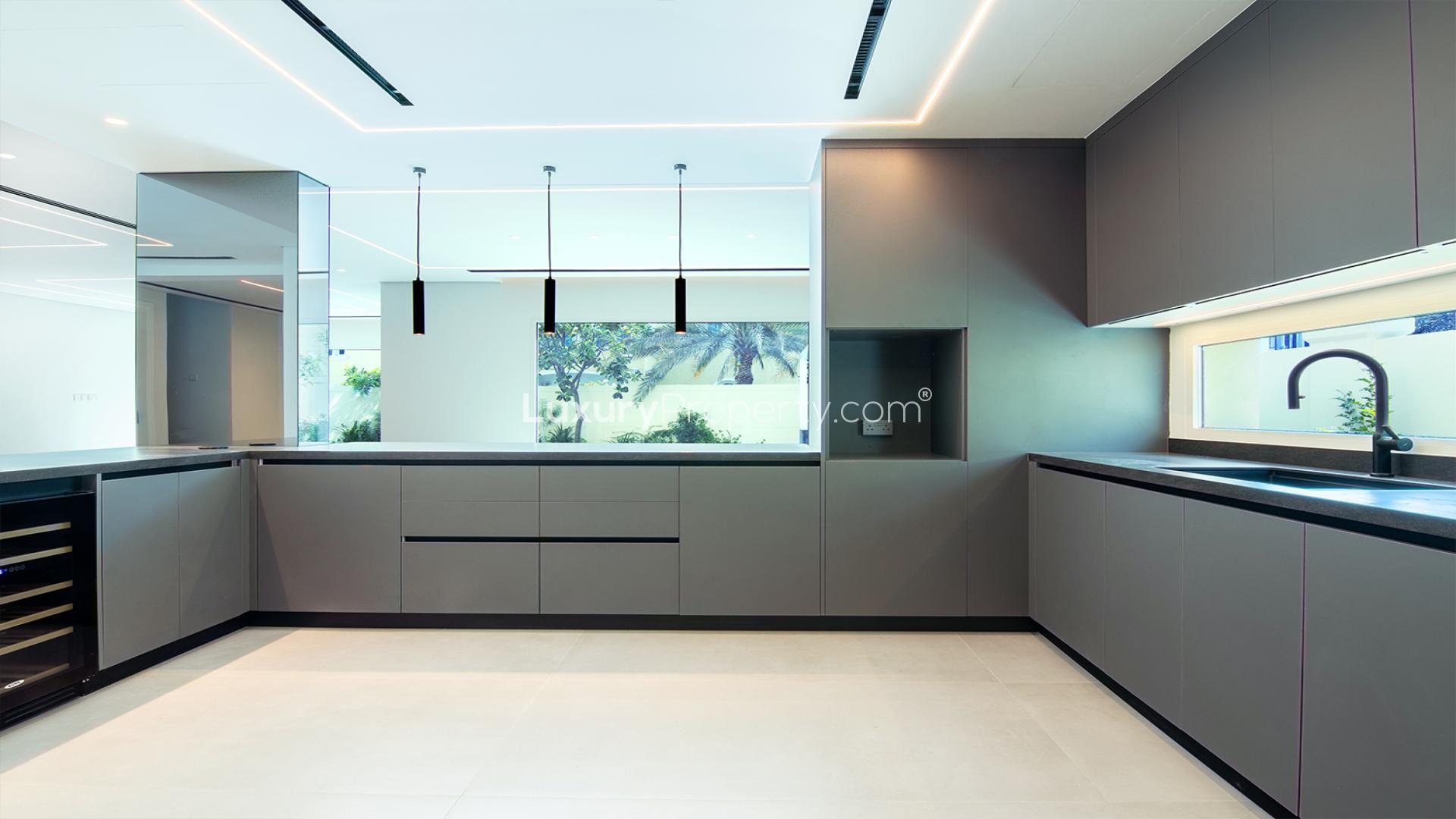 Modern kitchen and open living space in Jumeirah Park villa for sale